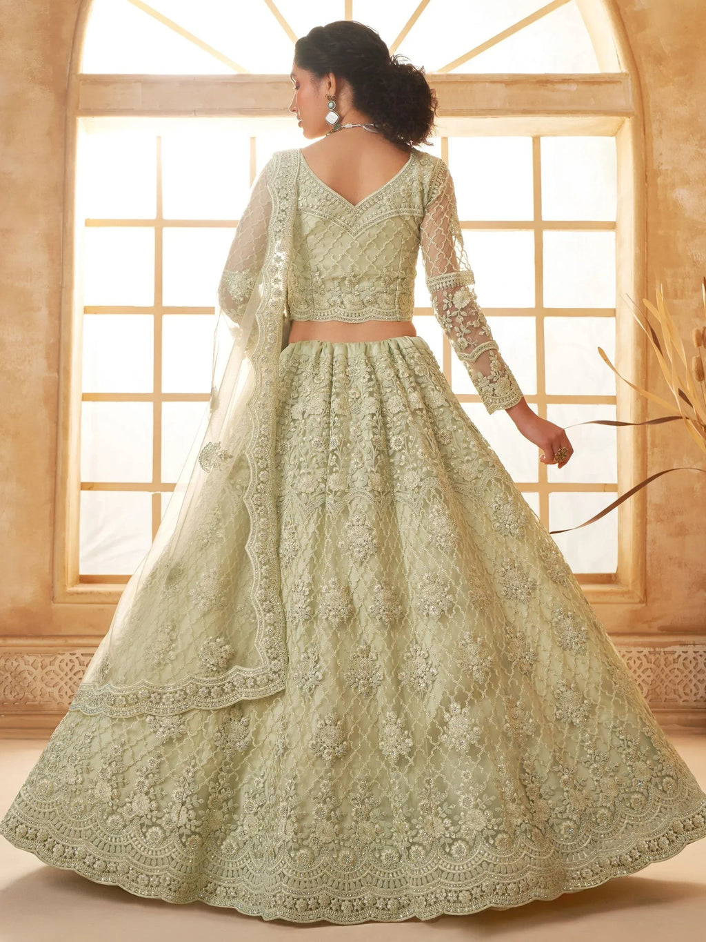 Fabulous Pista Green Embroidered Net Lehenga Choli With Dupatta