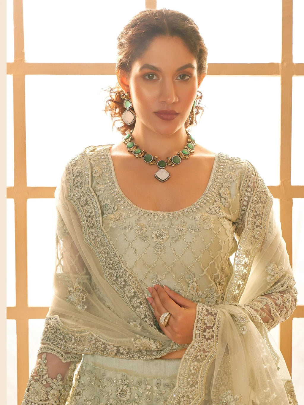 Fabulous Pista Green Embroidered Net Lehenga Choli With Dupatta