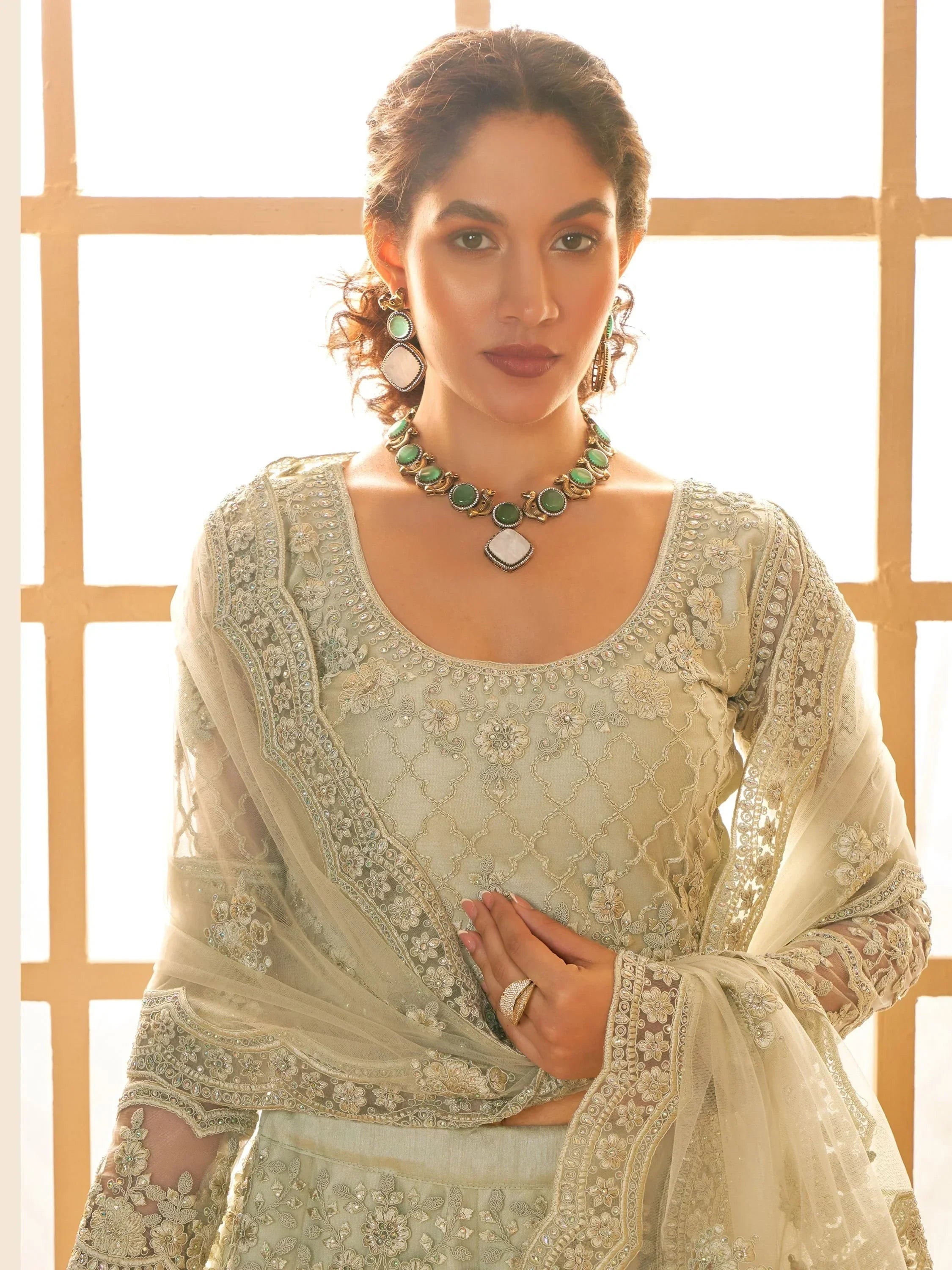 Fabulous Pista Green Embroidered Net Lehenga Choli With Dupatta