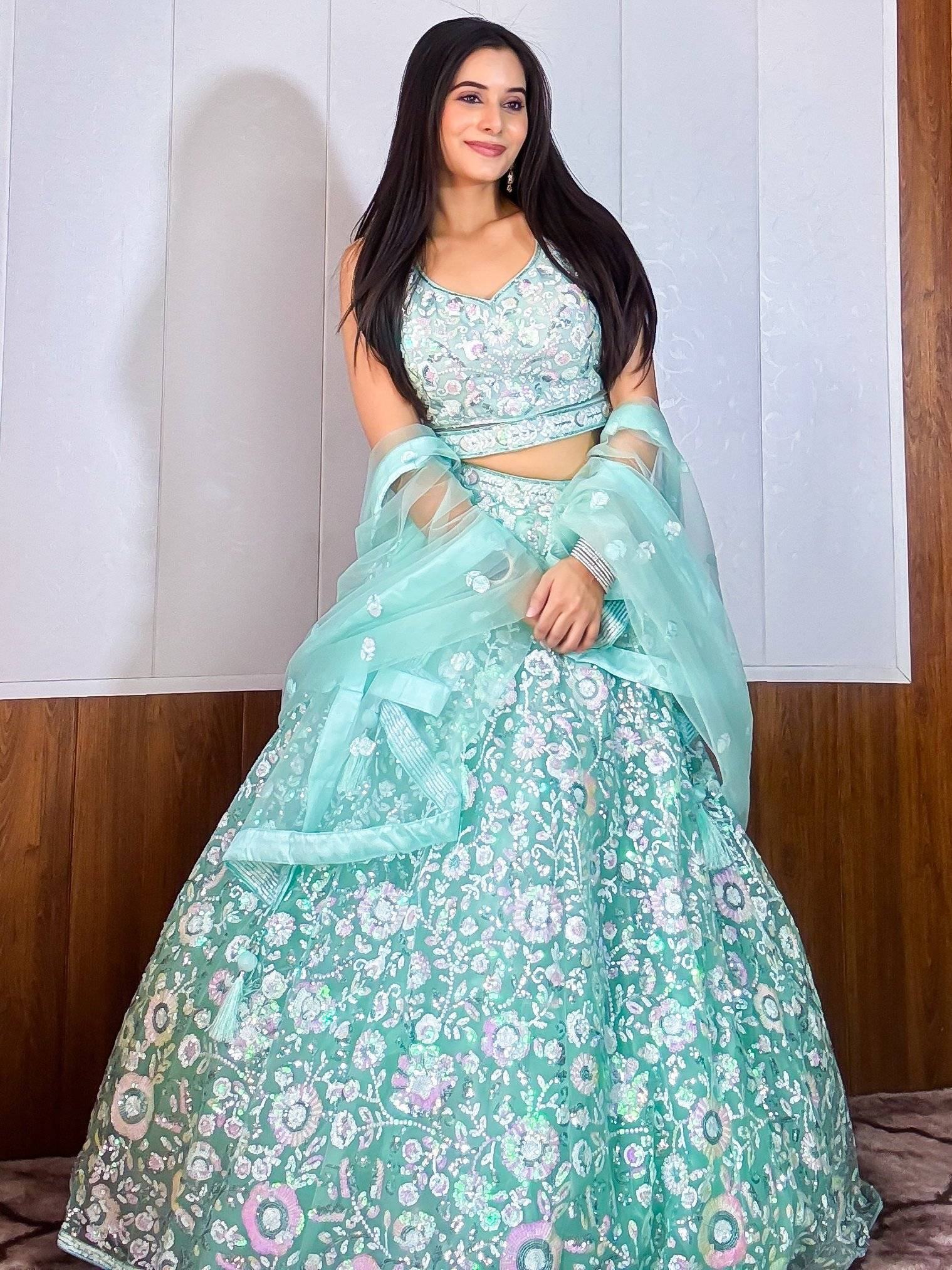 Fascinating Blue Sequins Net Reception Wear Lehenga Choli With Dupatta