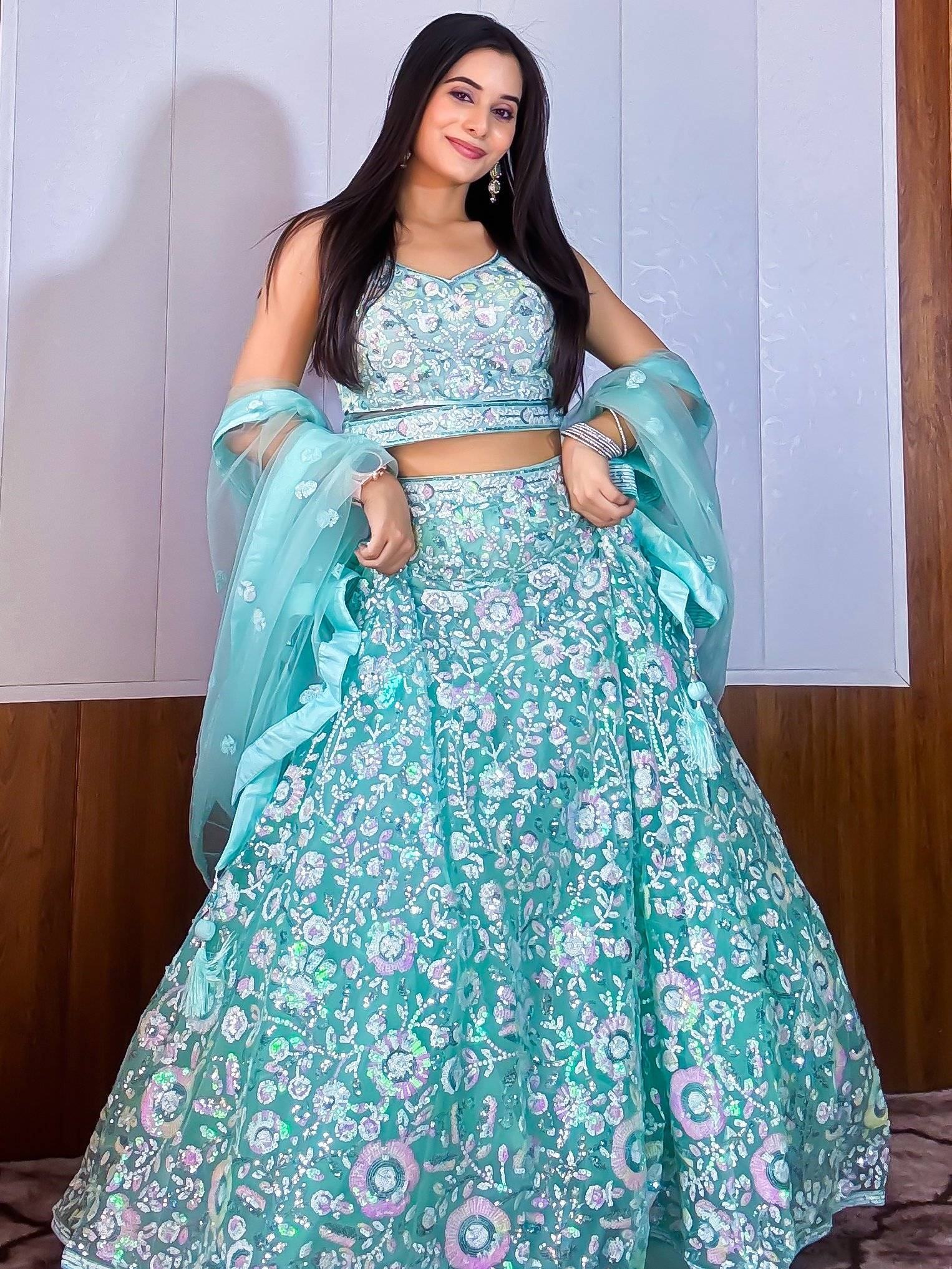 Fascinating Blue Sequins Net Reception Wear Lehenga Choli With Dupatta