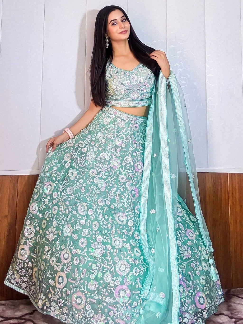 Fascinating Blue Sequins Net Reception Wear Lehenga Choli With Dupatta