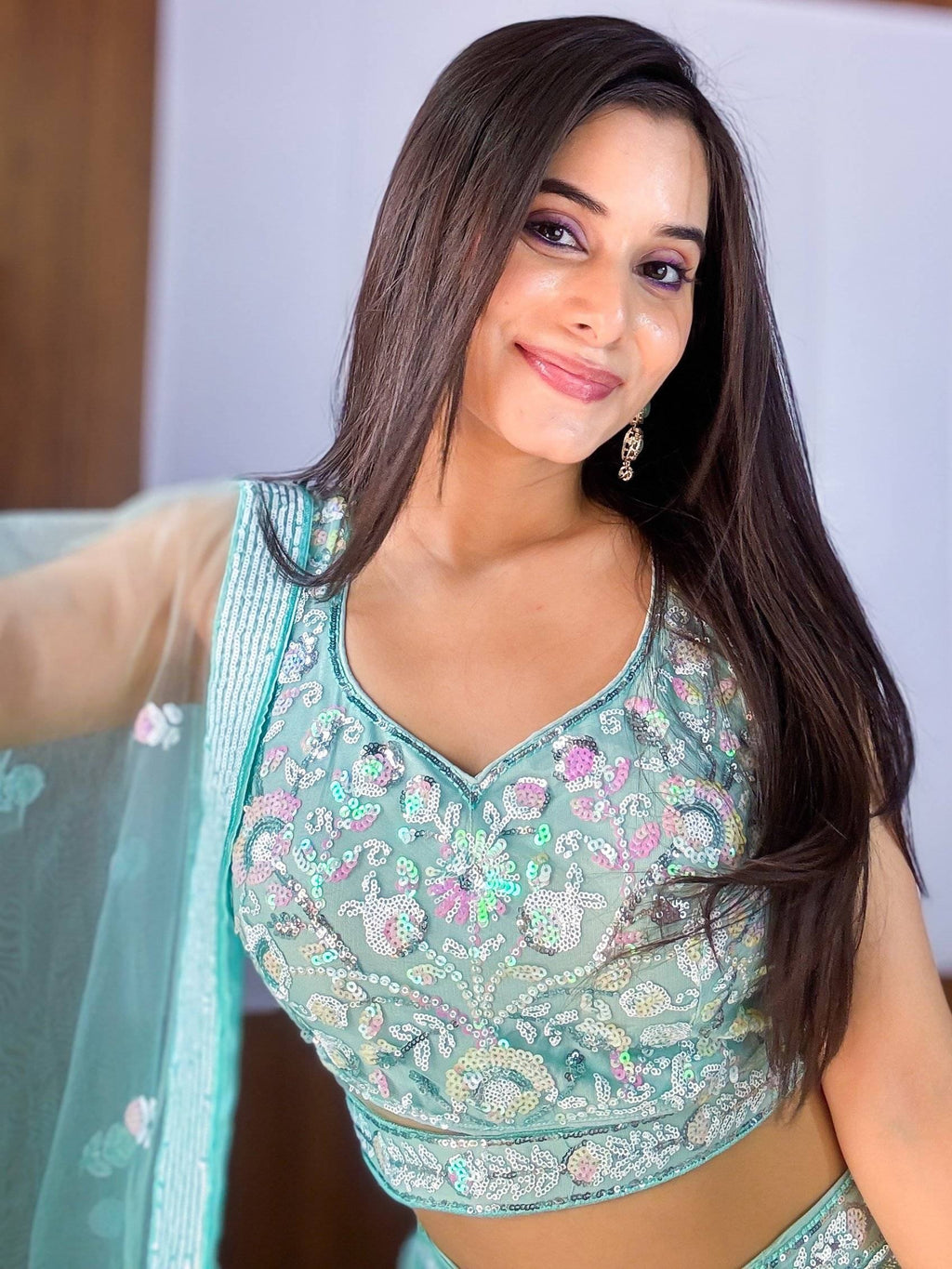 Fascinating Blue Sequins Net Reception Wear Lehenga Choli With Dupatta