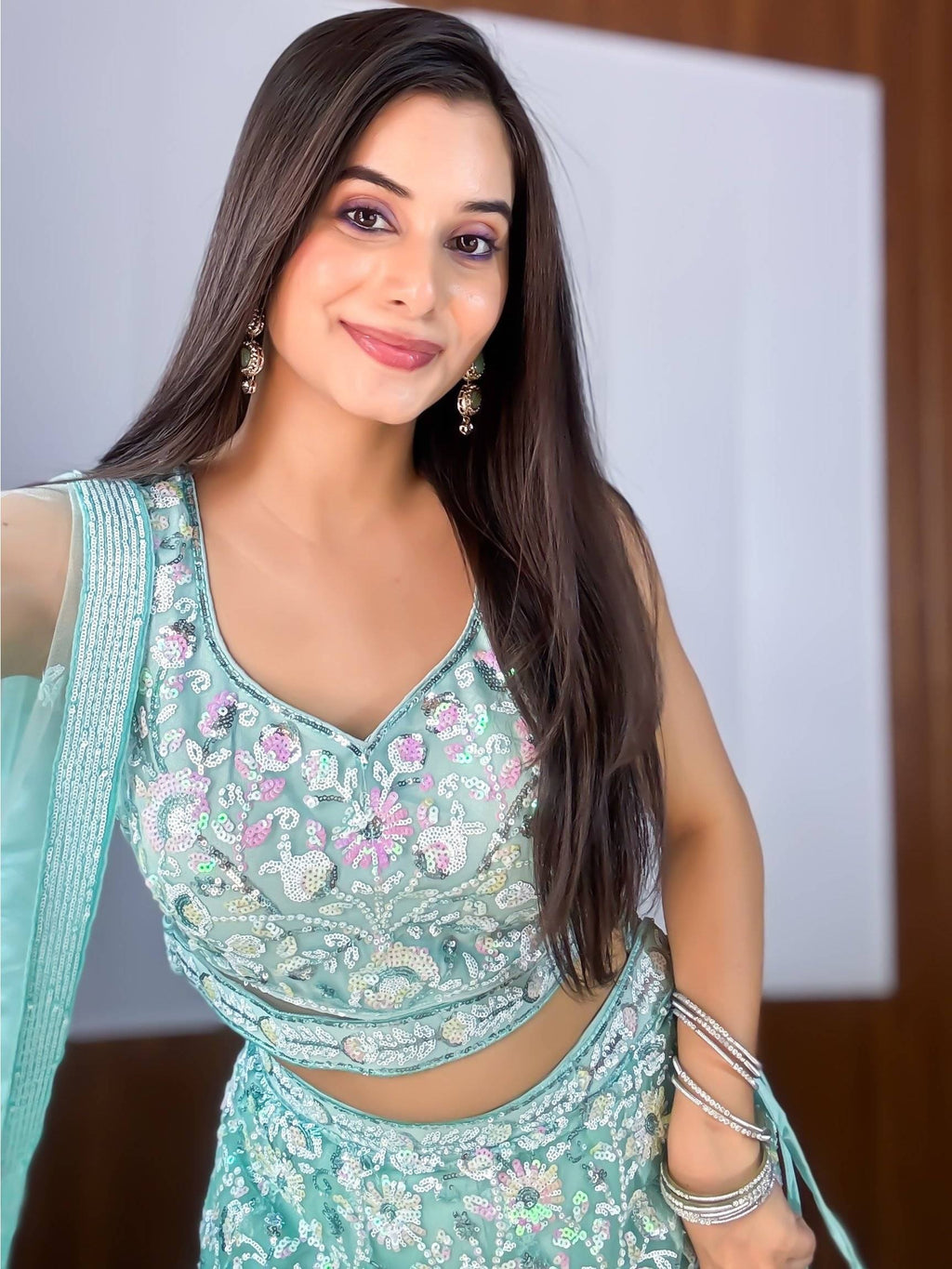 Fascinating Blue Sequins Net Reception Wear Lehenga Choli With Dupatta
