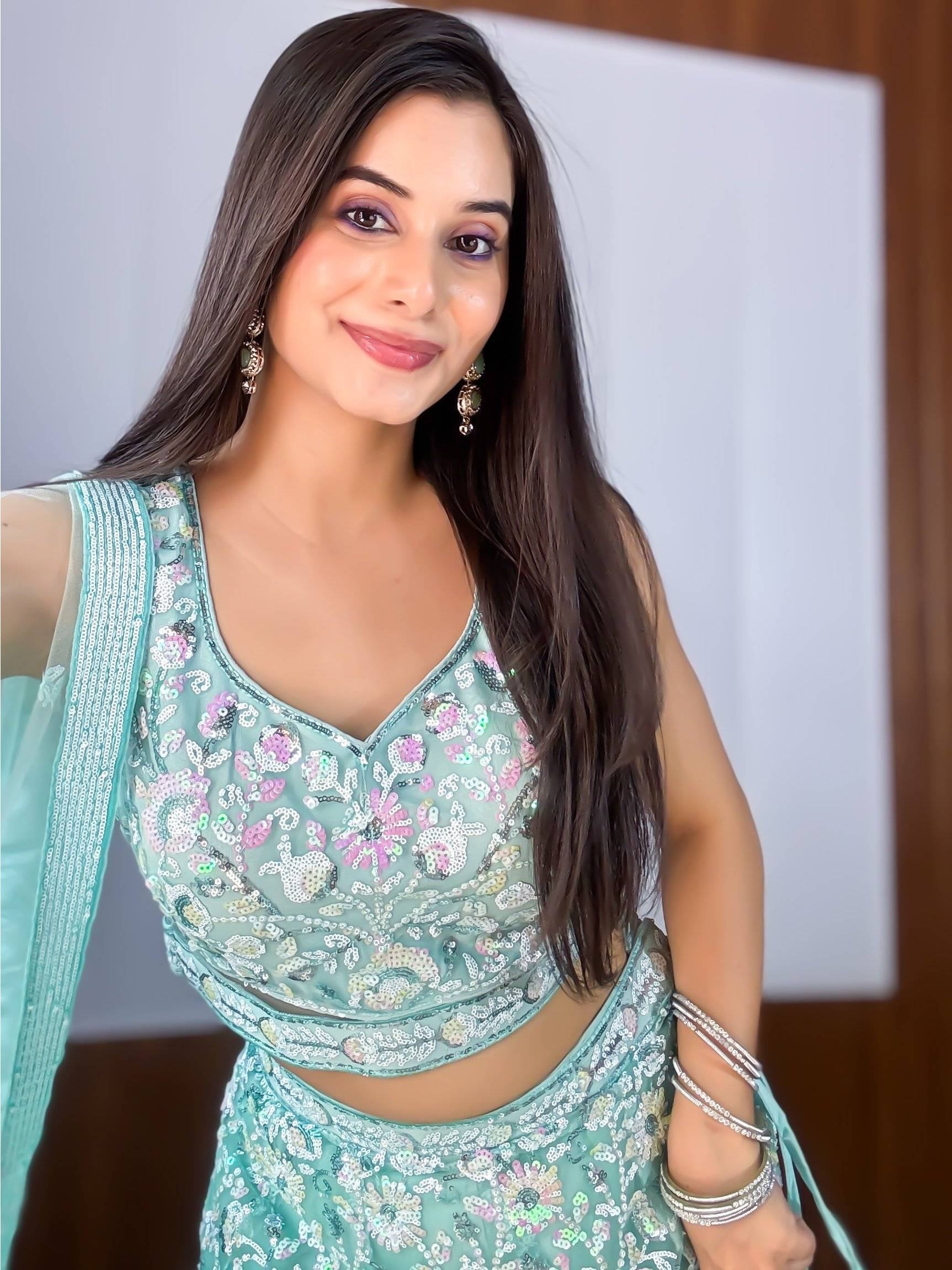 Fascinating Blue Sequins Net Reception Wear Lehenga Choli With Dupatta