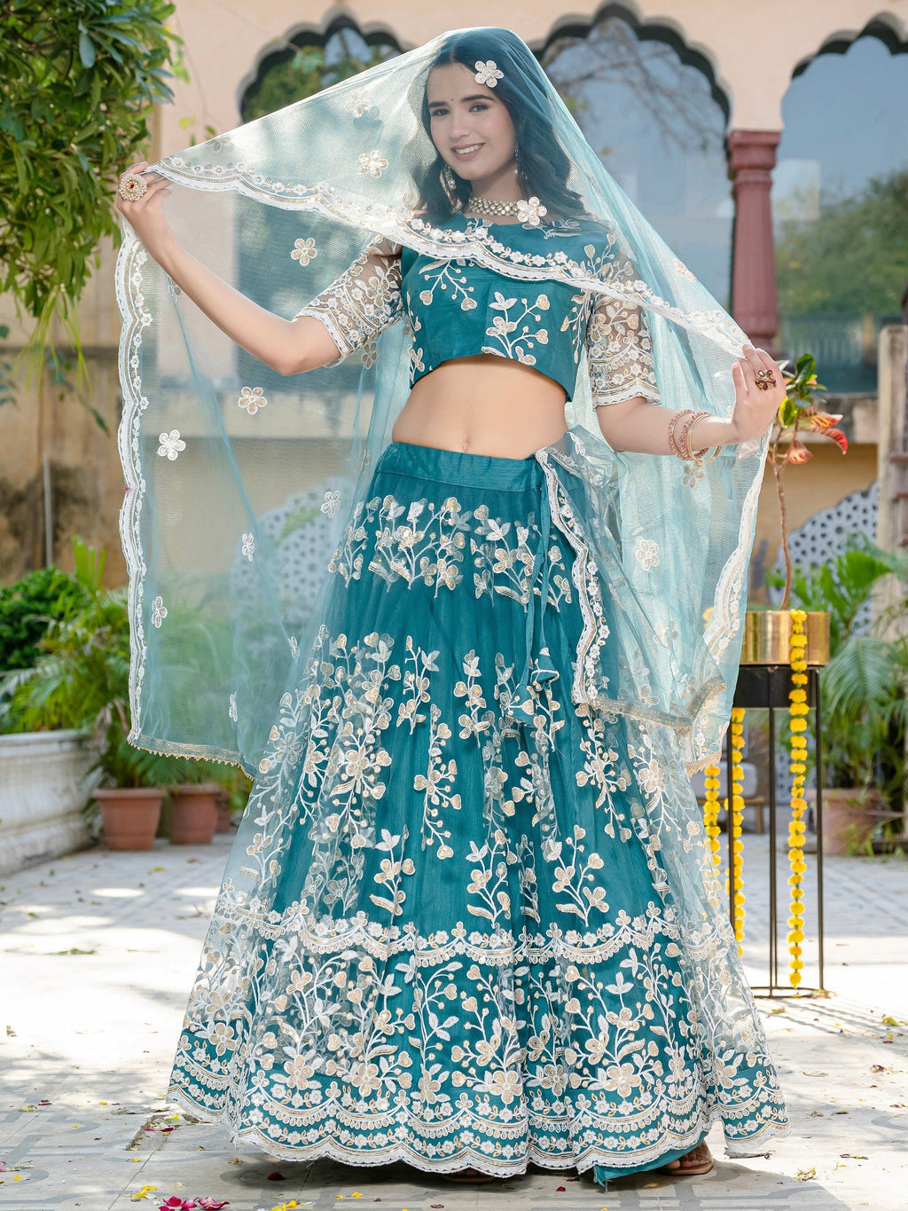 Fascinating Rama Blue Thread Embroidered Wedding Wear Lehenga Choli