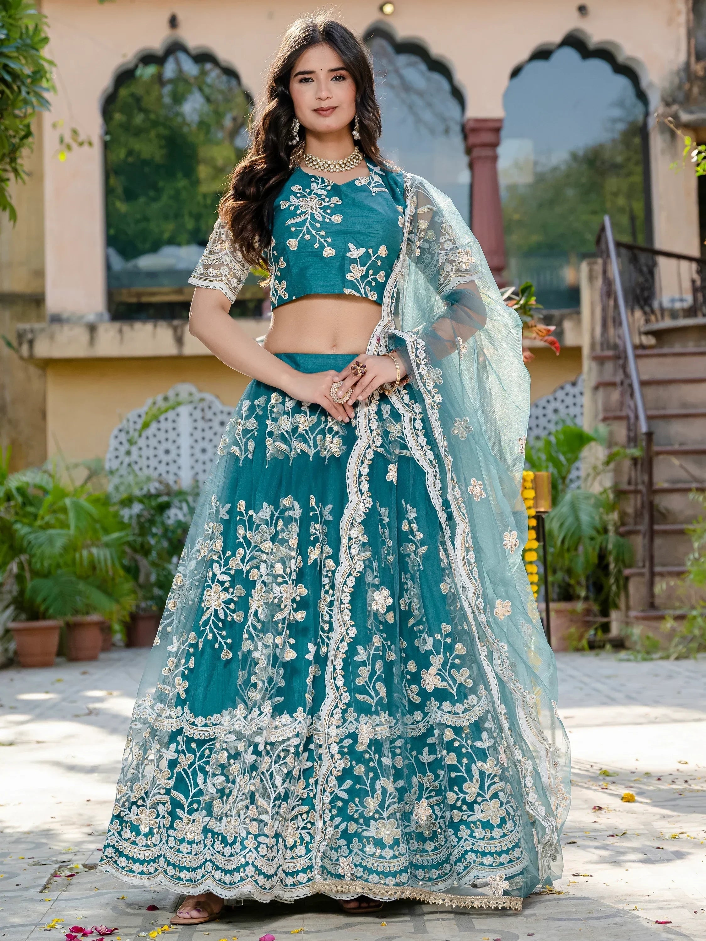 Fascinating Rama Blue Thread Embroidered Wedding Wear Lehenga Choli