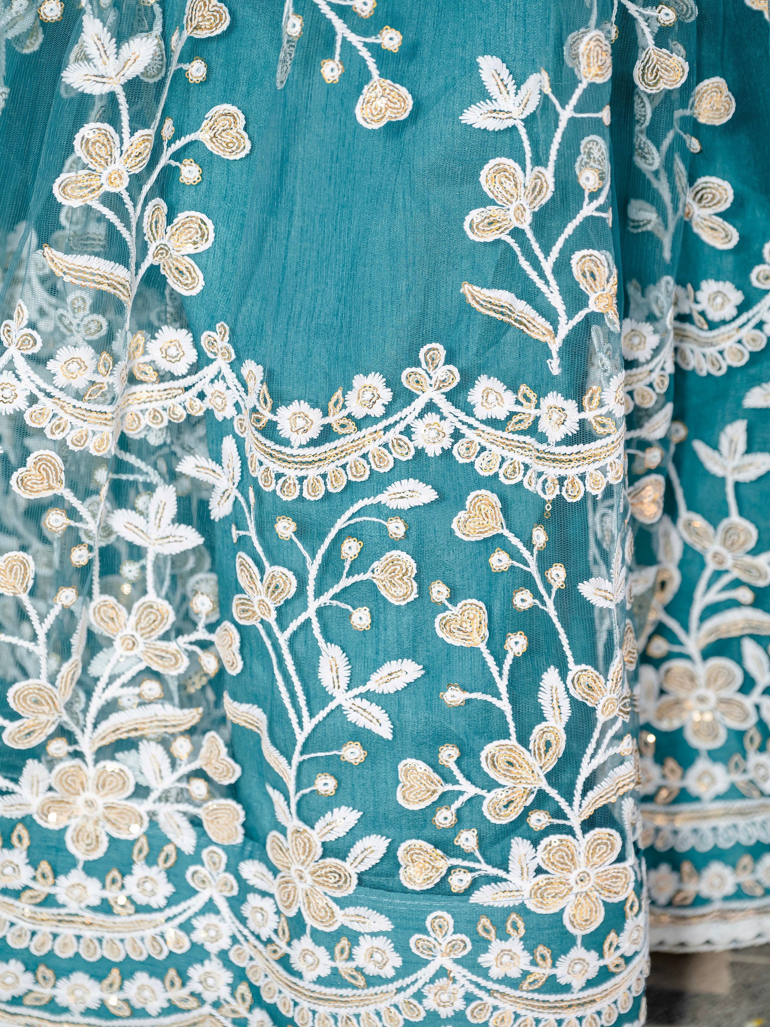 Fascinating Rama Blue Thread Embroidered Wedding Wear Lehenga Choli