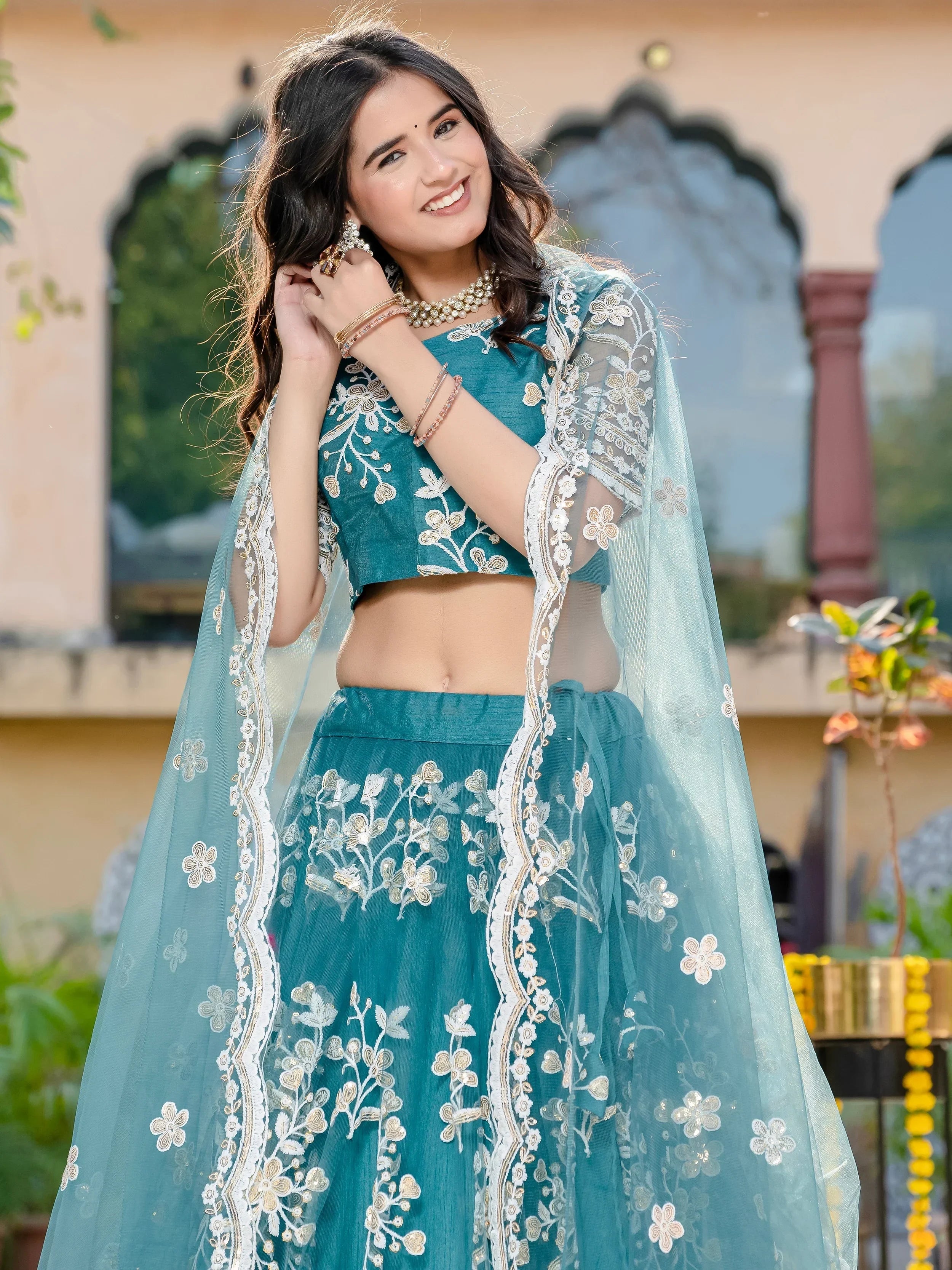 Fascinating Rama Blue Thread Embroidered Wedding Wear Lehenga Choli