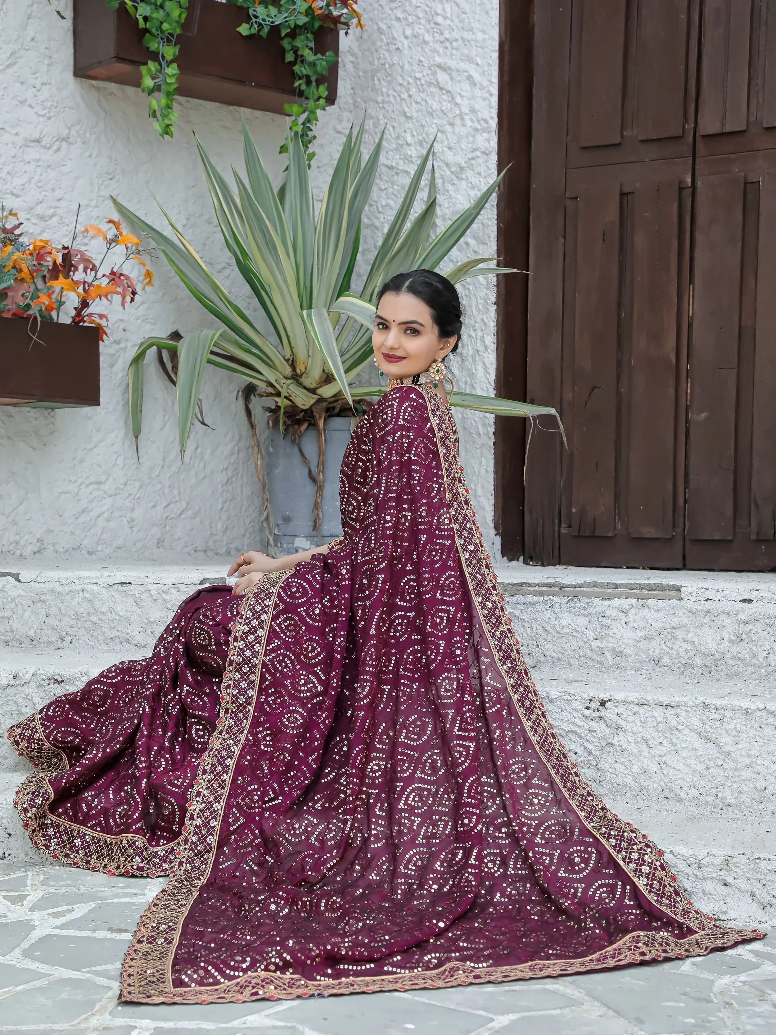 Stunning Wine Sequins Georgette Function Wear Saree With Blouse