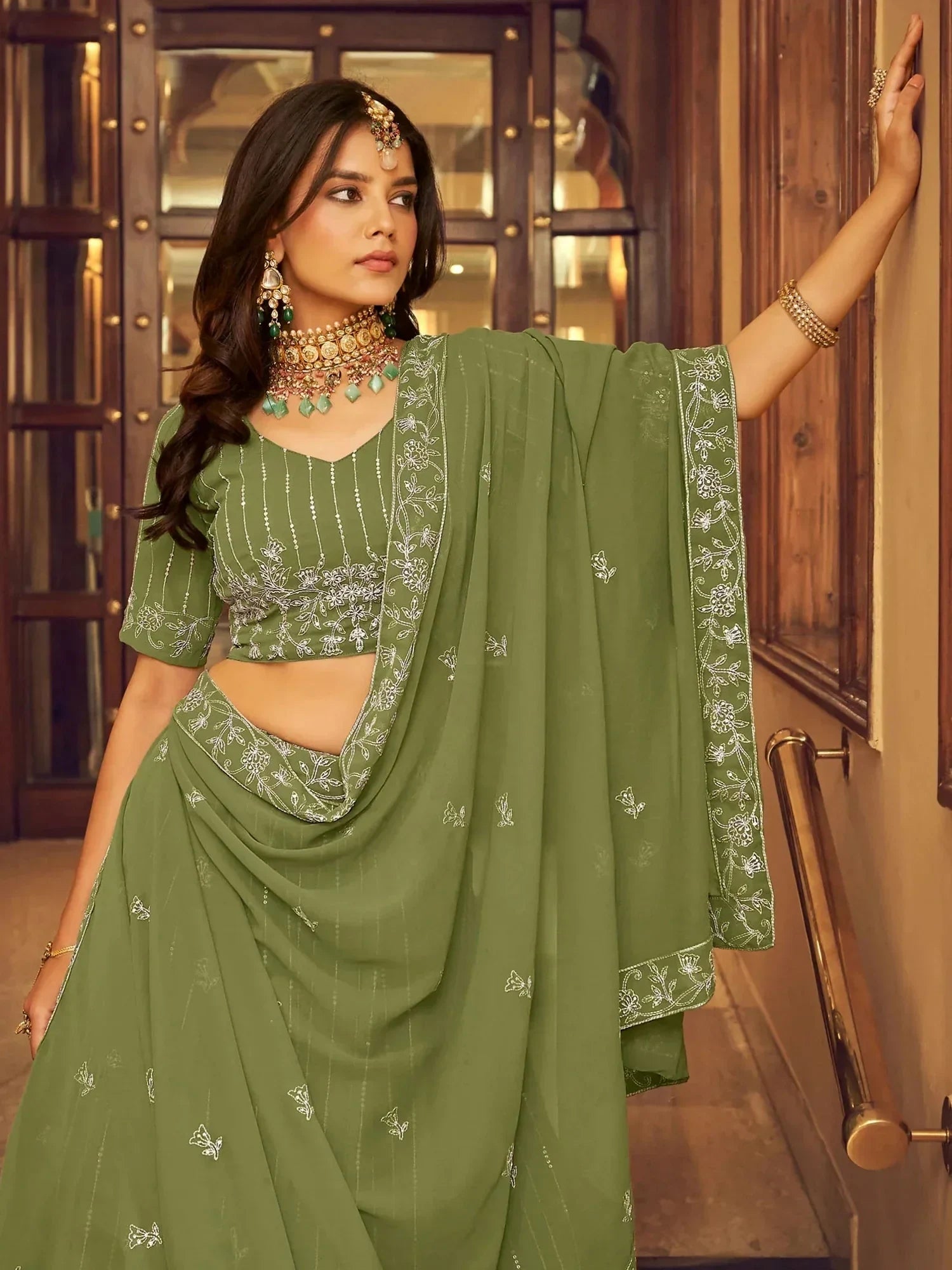 Pretty Green Thread Embroidered Georgette Wedding Wear Lehenga Choli