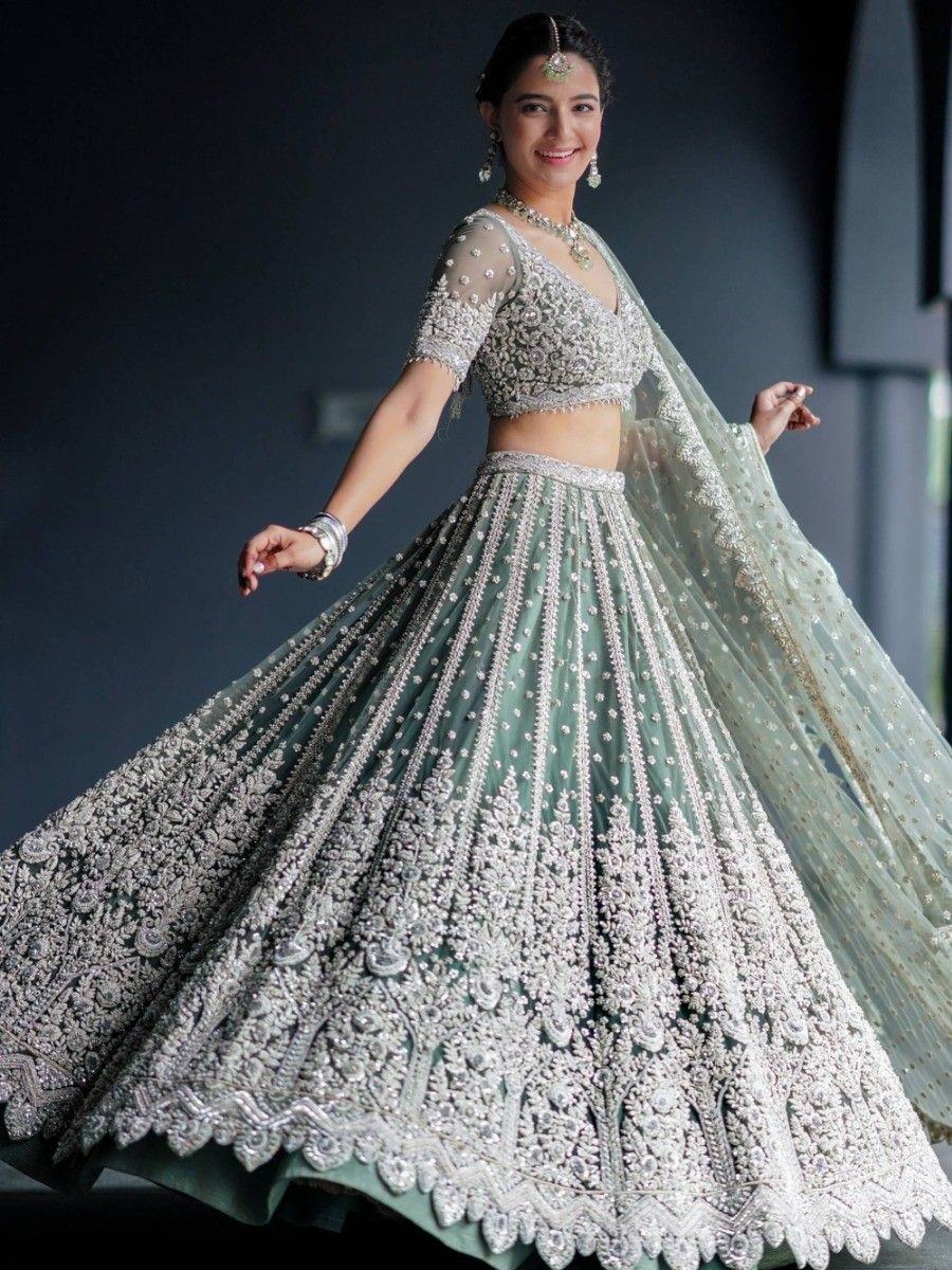 Green Alluring Sequins Net Engagement Wear Lehenga Choli With Dupatta