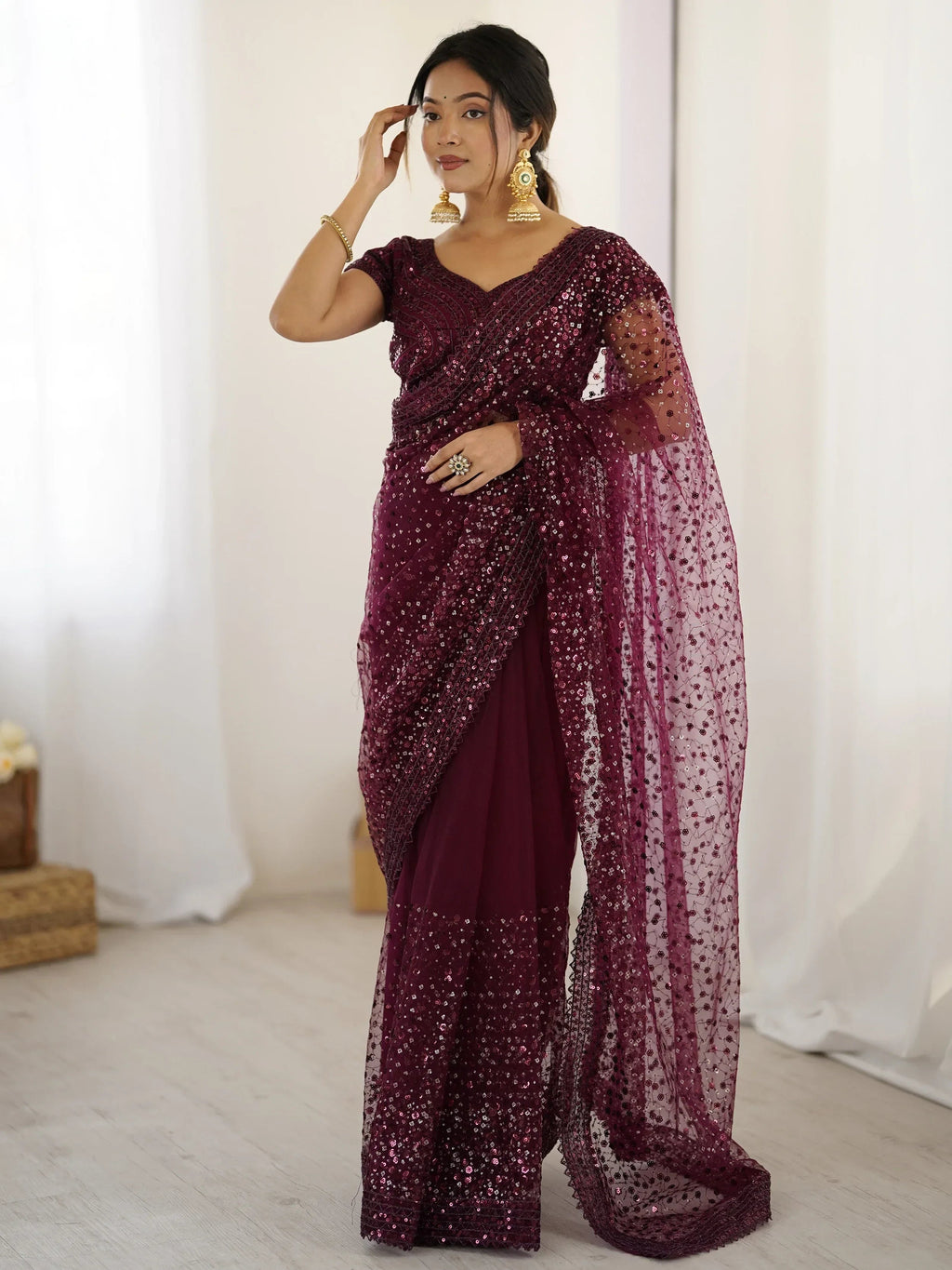 Glamourous Wine Sequins Net Festival Wear Saree With Blouse