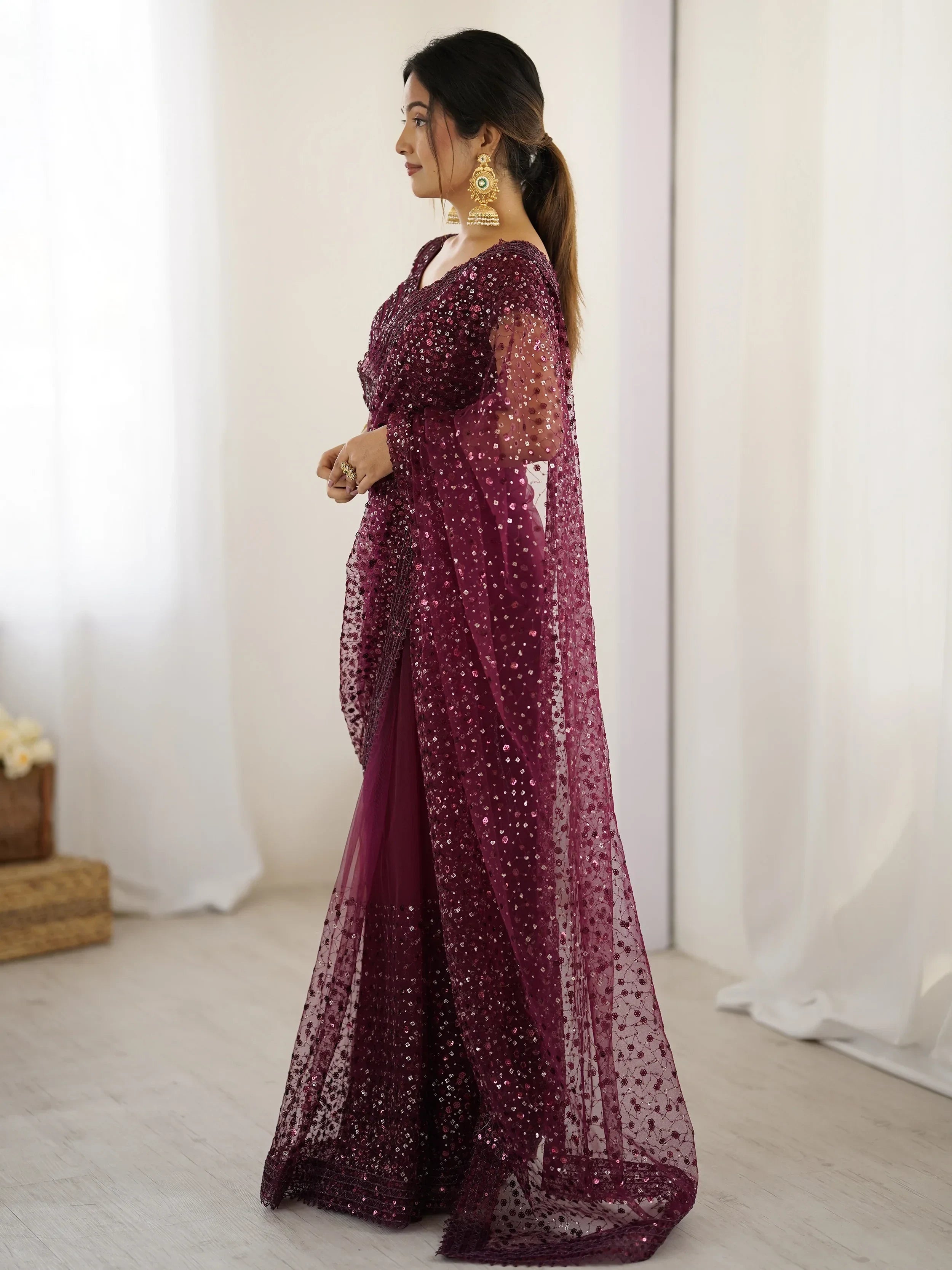 Glamourous Wine Sequins Net Festival Wear Saree With Blouse