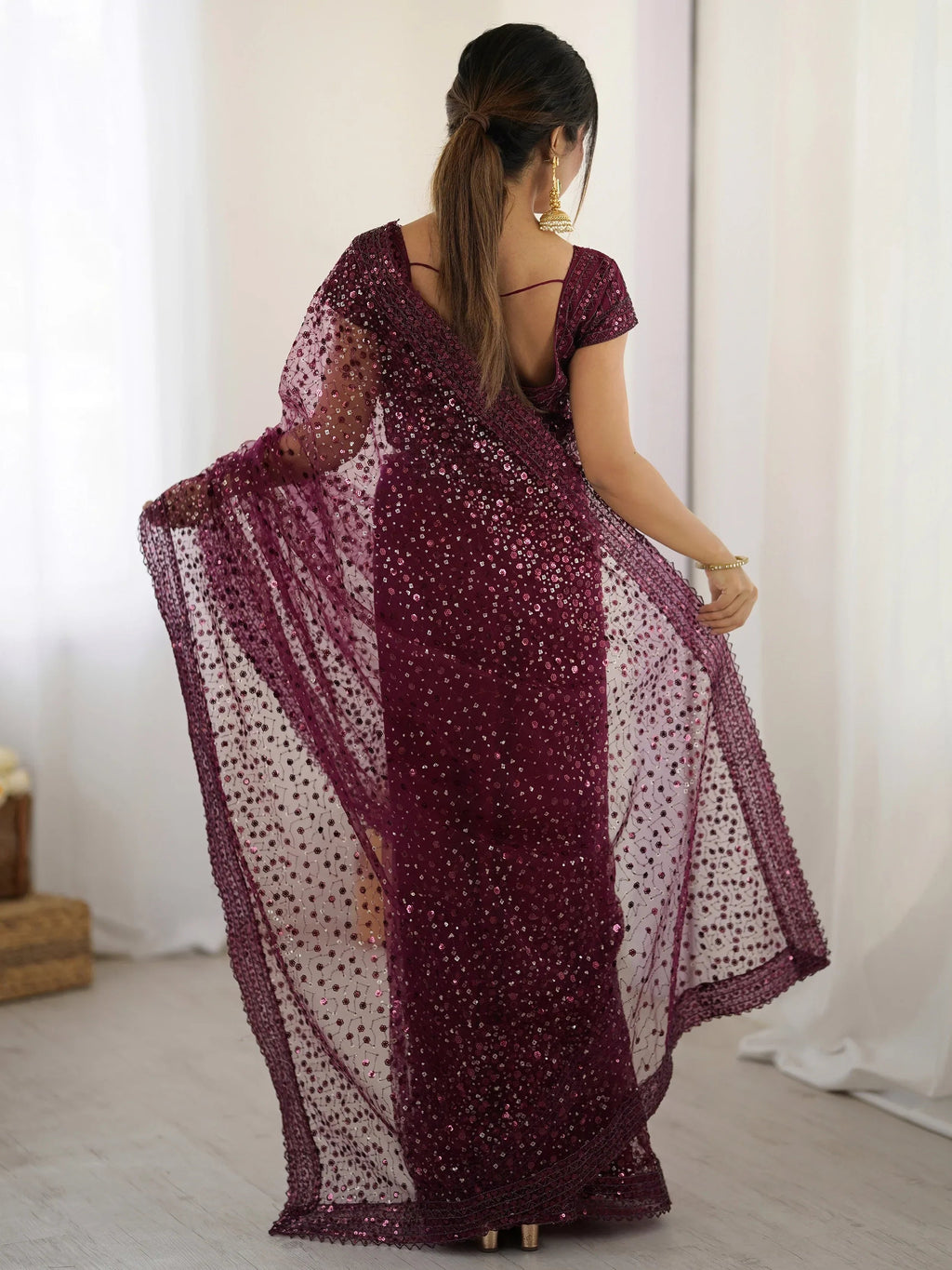 Glamourous Wine Sequins Net Festival Wear Saree With Blouse