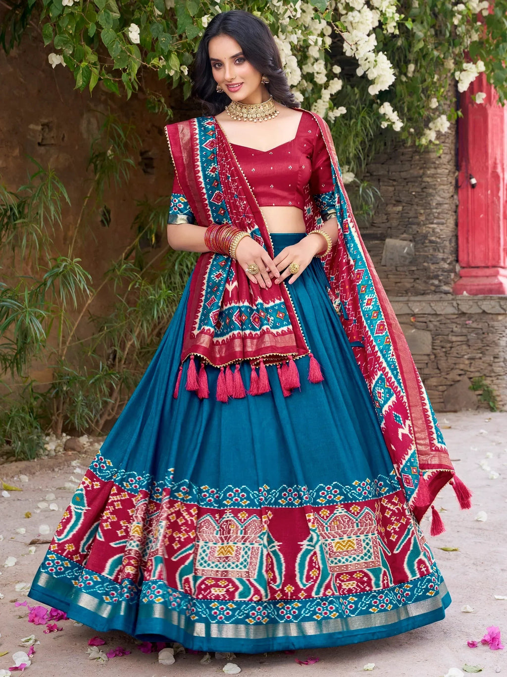 Glorious Teal Blue Patola Printed Tussar Silk Festive Wear Lehenga Choli