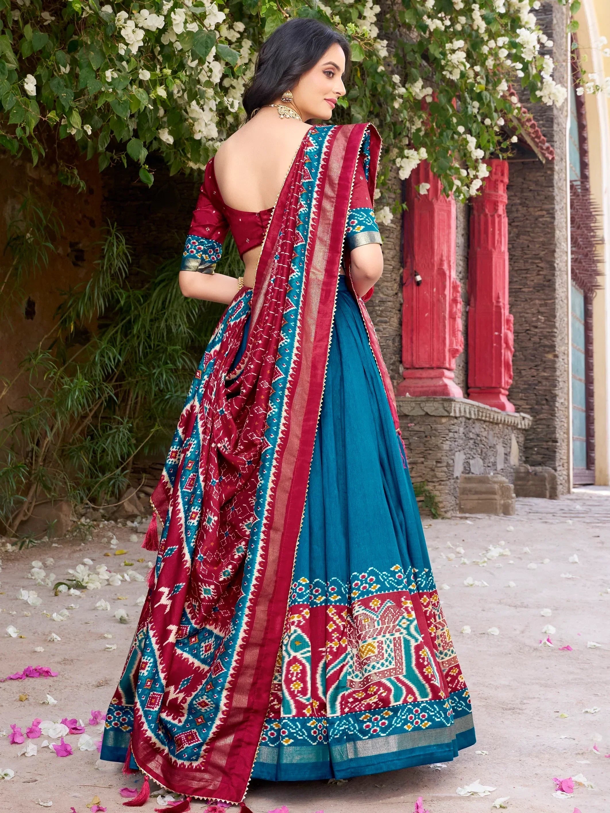 Glorious Teal Blue Patola Printed Tussar Silk Festive Wear Lehenga Choli