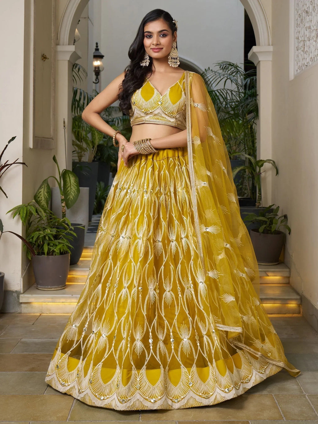 Gorgeous Mustard Yellow Embroidered Net Haldi Wear Lehenga Choli