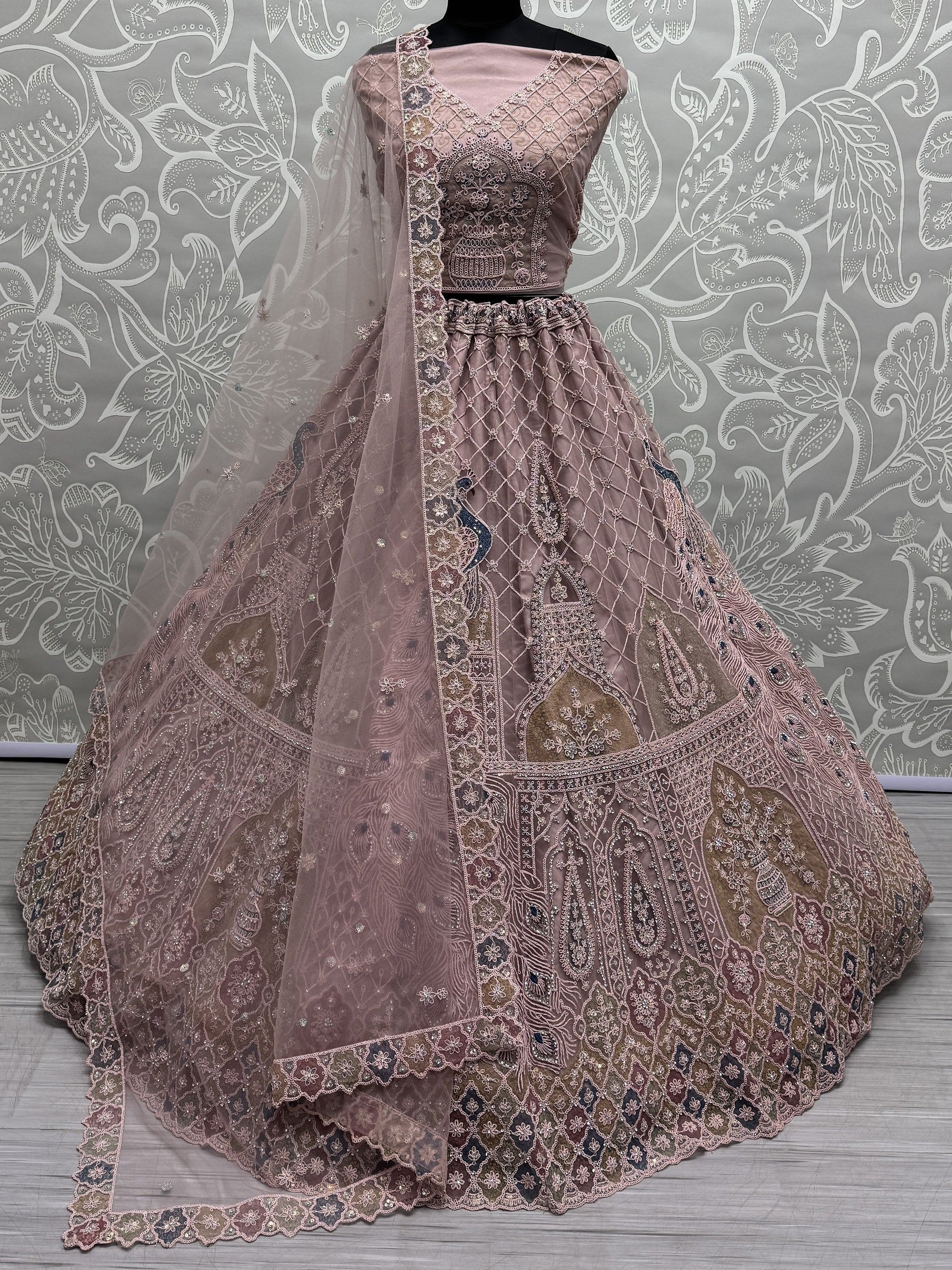 Peach Gorgeous Sequins Net Engagement Wear Lehenga Choli