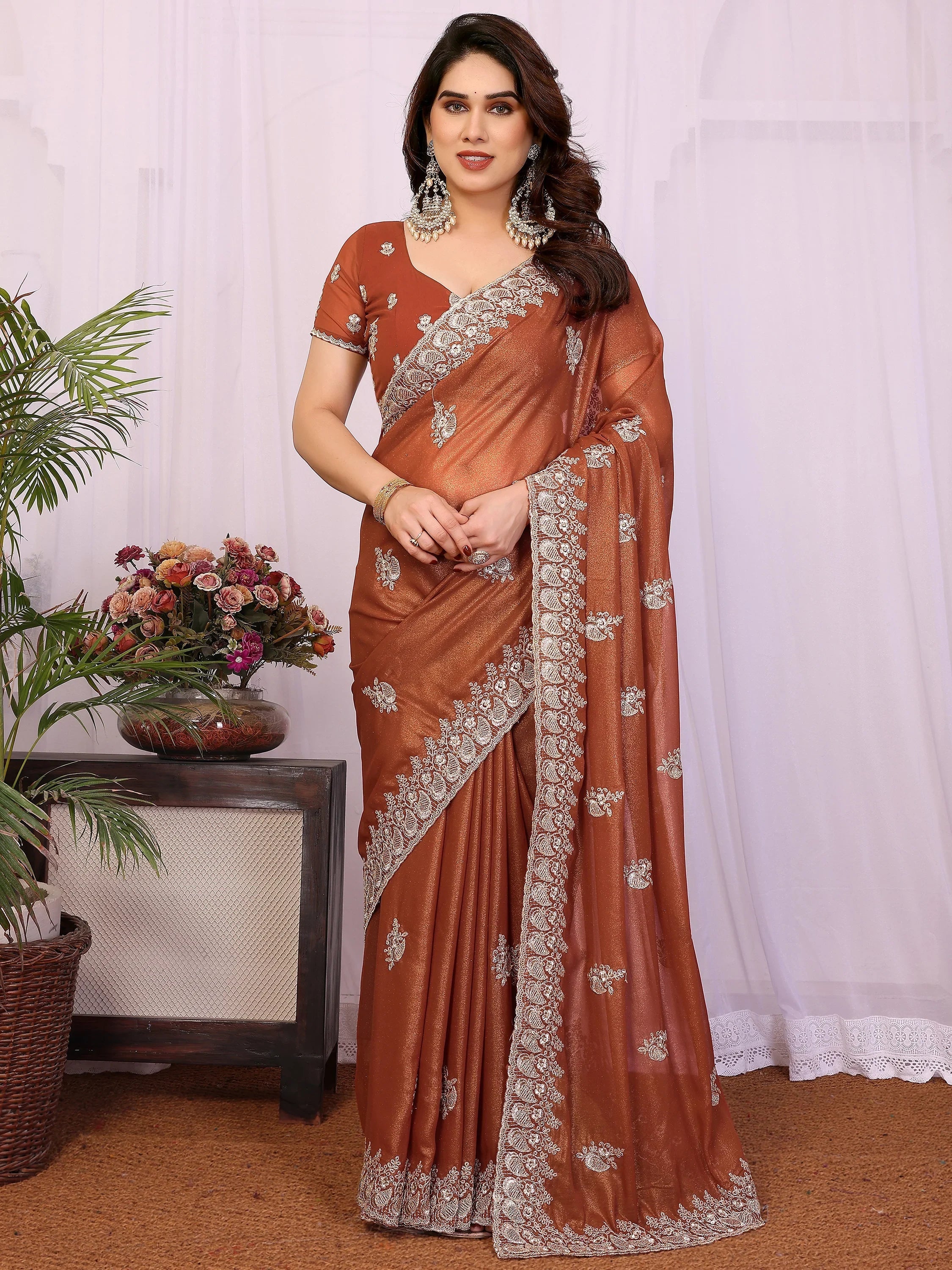 Awesome Brown Zari Embroidered Georgette Saree With Blouse