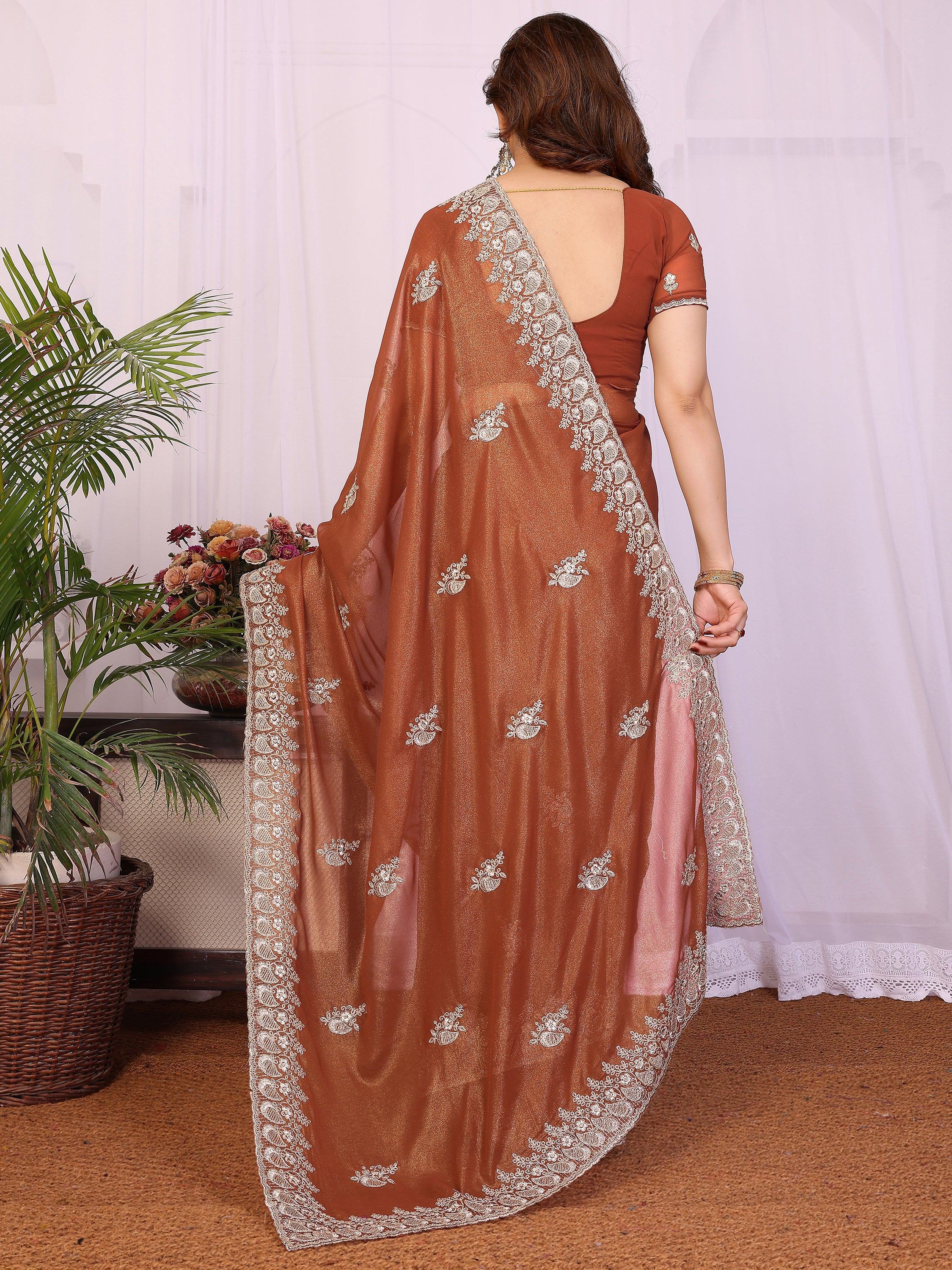 Awesome Brown Zari Embroidered Georgette Saree With Blouse