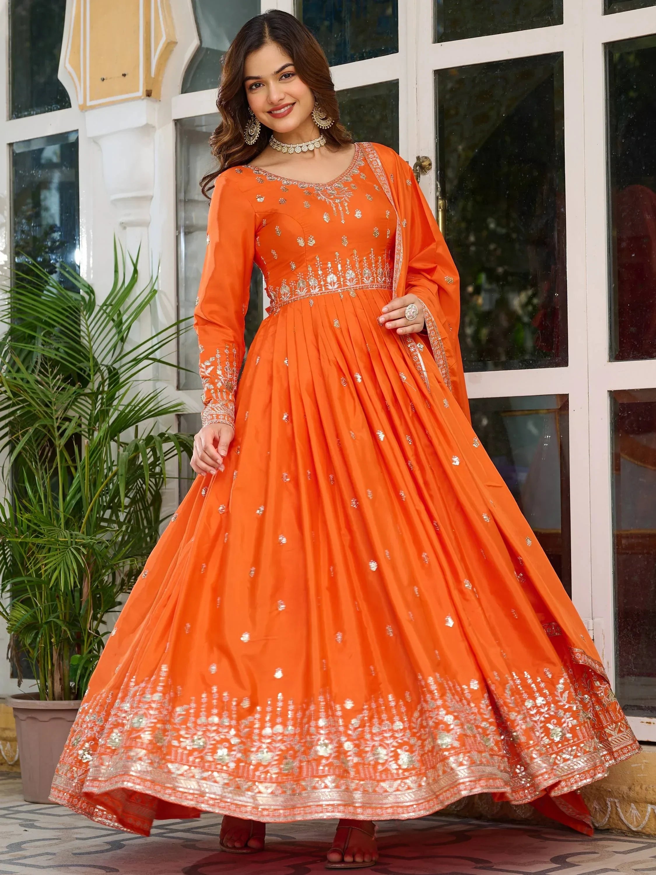 Orange Spectacular Sequins Work Silk Festive Wear Gown With Dupatta