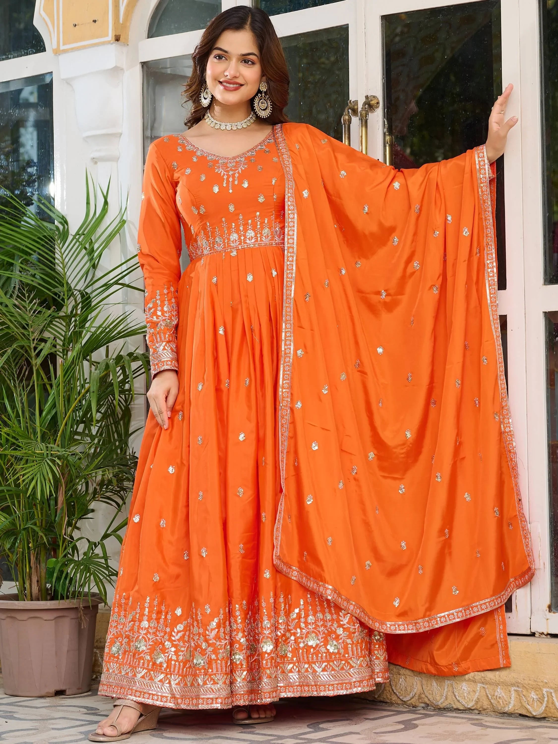 Orange Spectacular Sequins Work Silk Festive Wear Gown With Dupatta