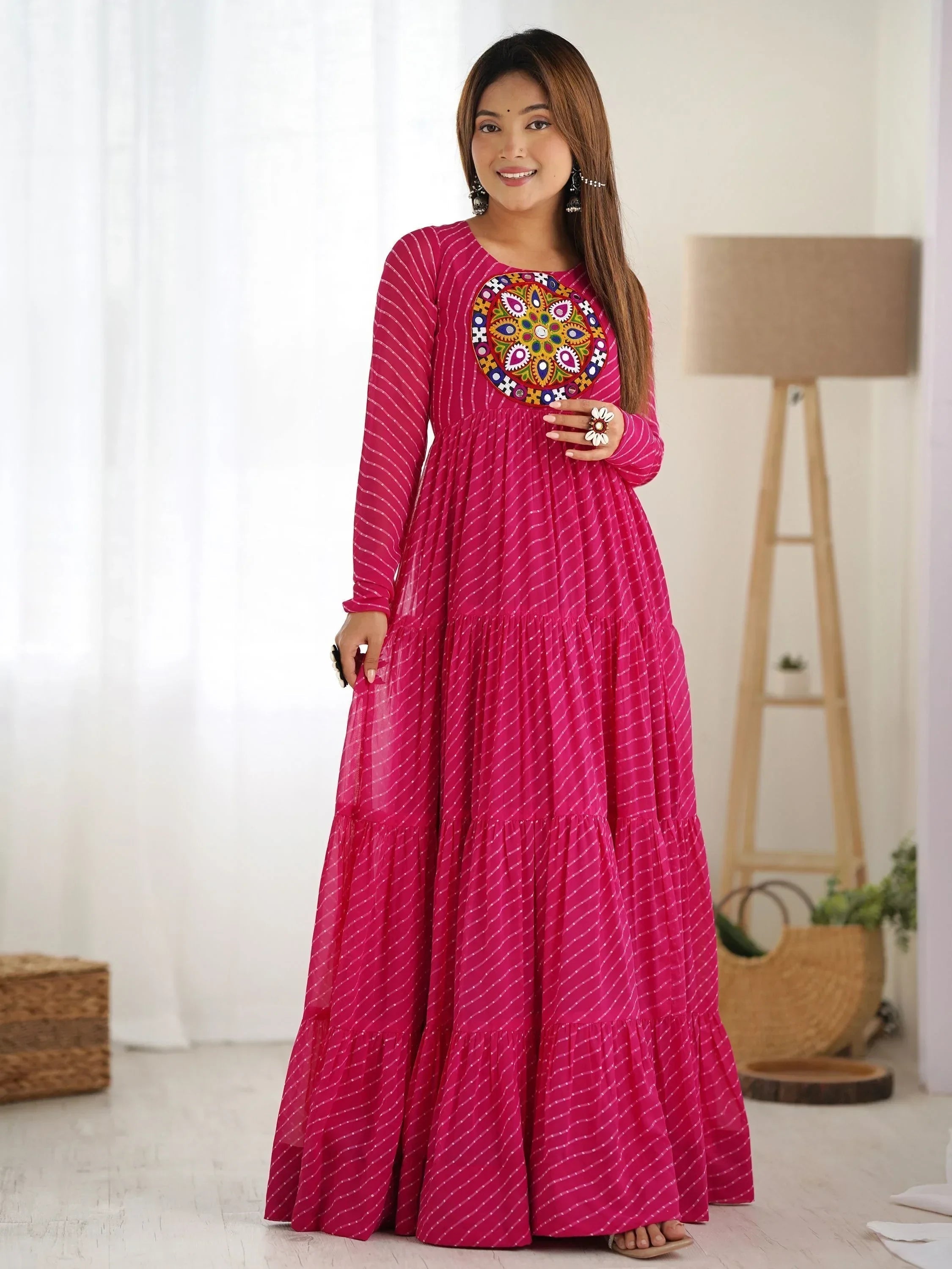 Enchanting Rani Pink Laheriya Printed Georgette Navratri Wear Gown