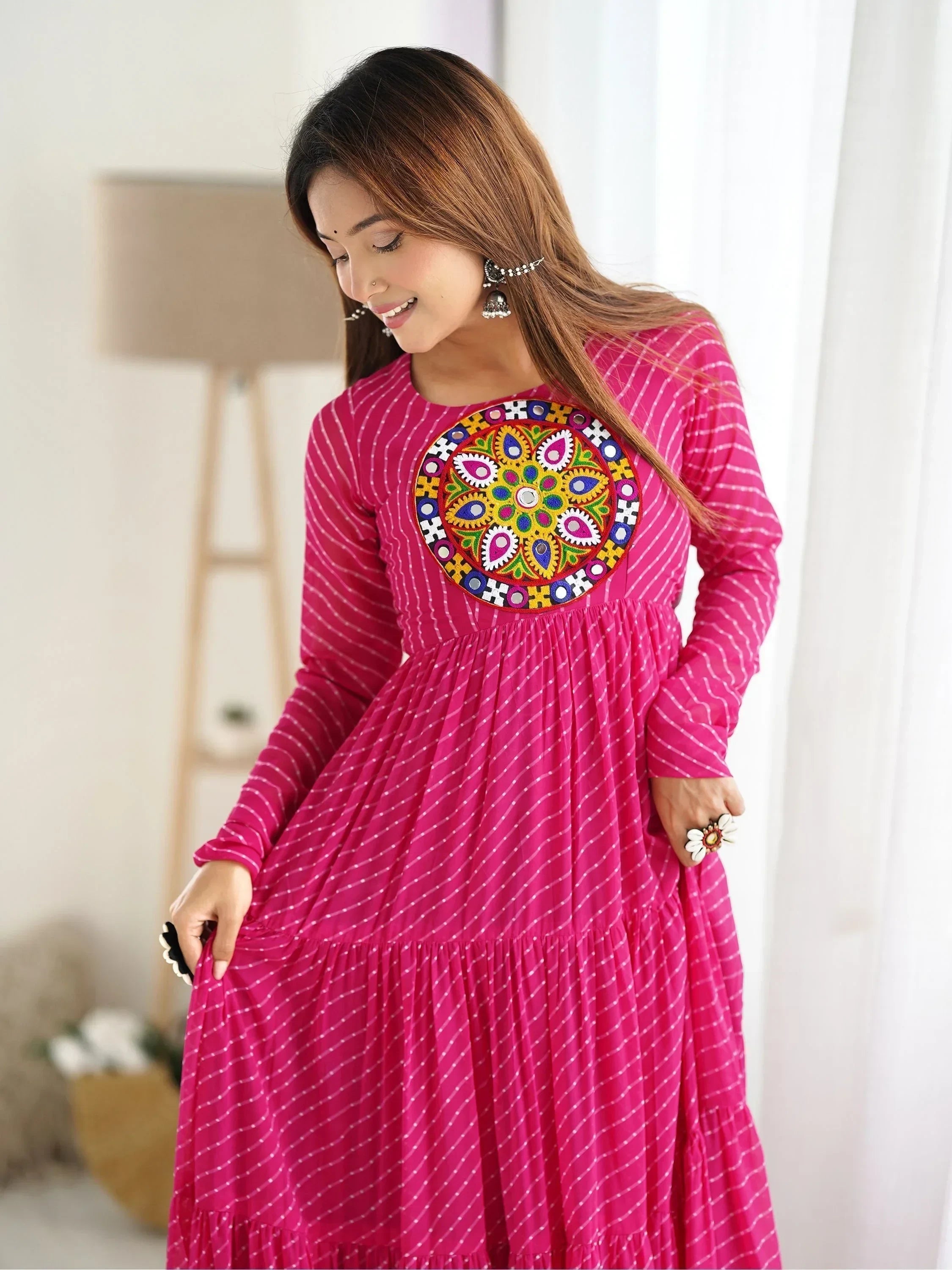Enchanting Rani Pink Laheriya Printed Georgette Navratri Wear Gown