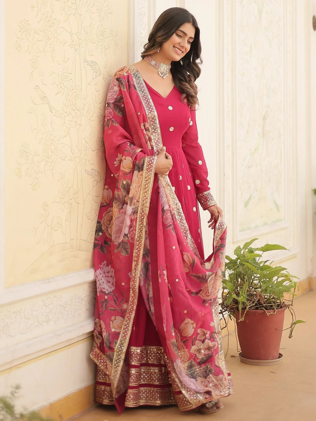 Fascinating Rani Pink Embroidered Georgette Event Wear Gown