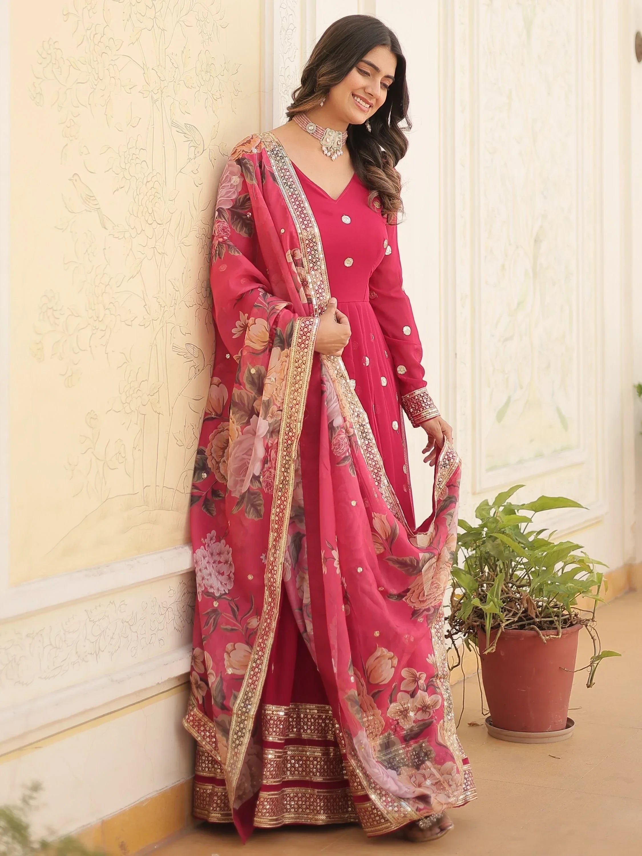 Fascinating Rani Pink Embroidered Georgette Event Wear Gown