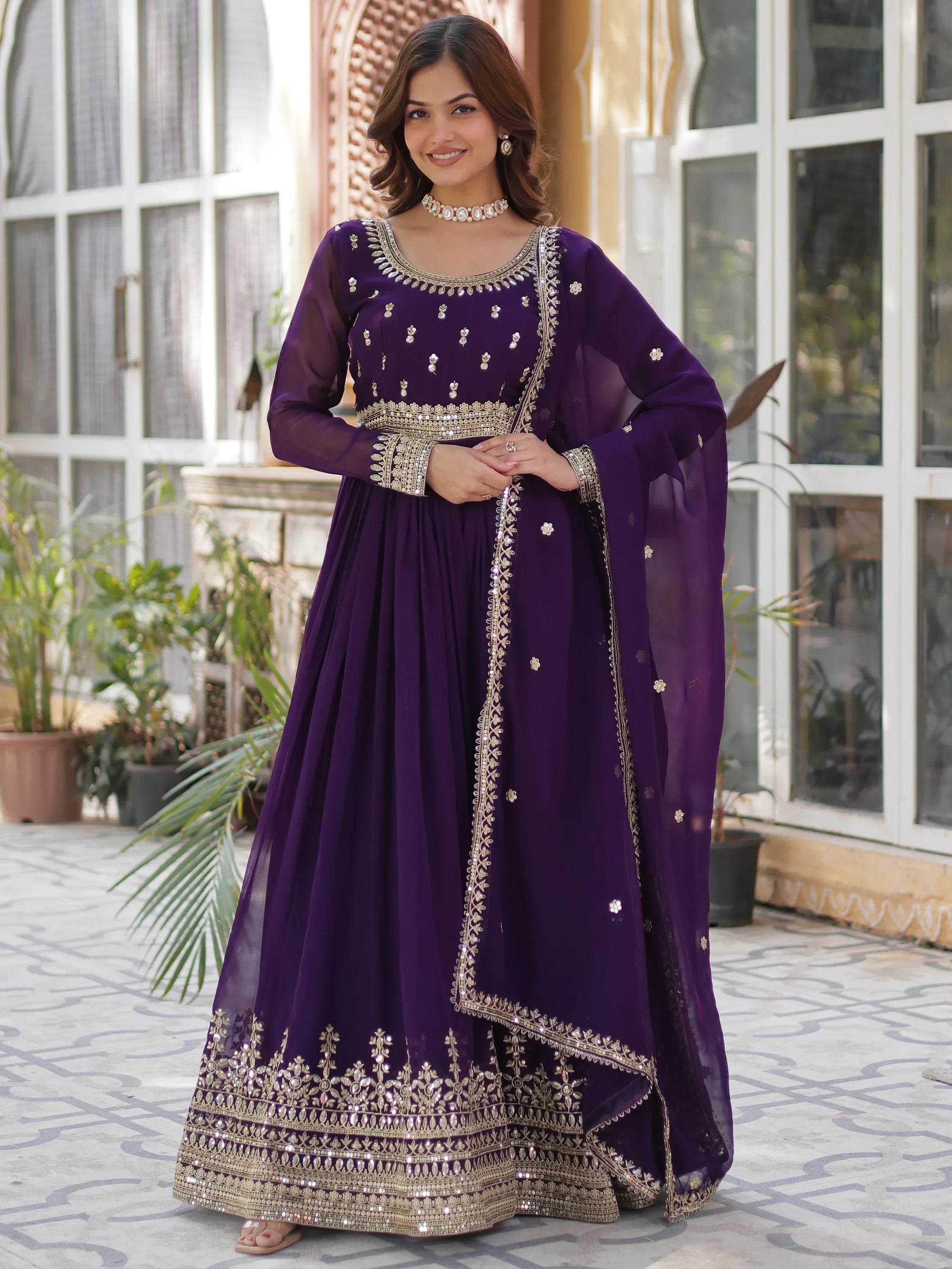 Purple Wonderful Zari Embroidered Georgette Wedding Wear Gown