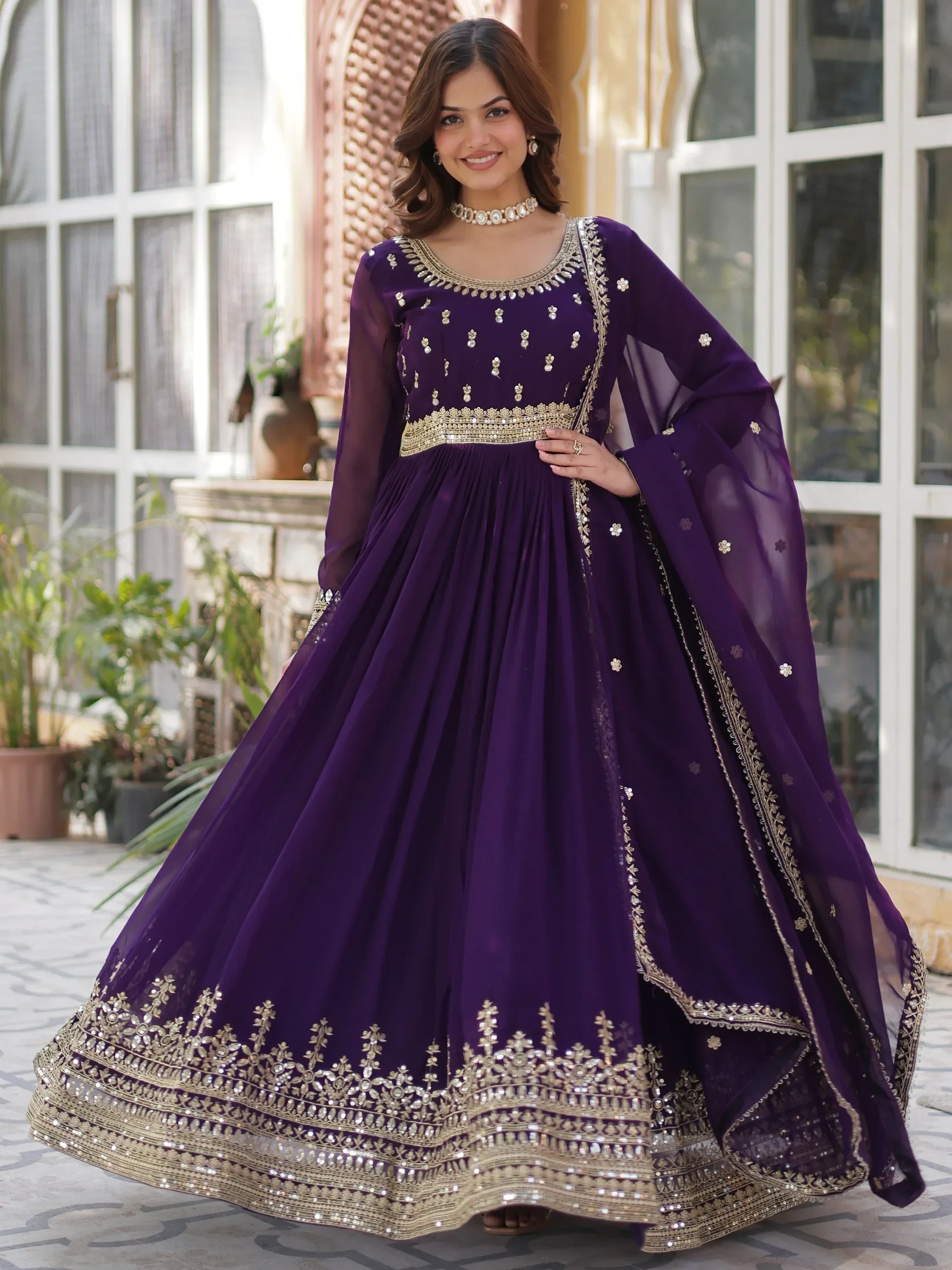 Purple Wonderful Zari Embroidered Georgette Wedding Wear Gown