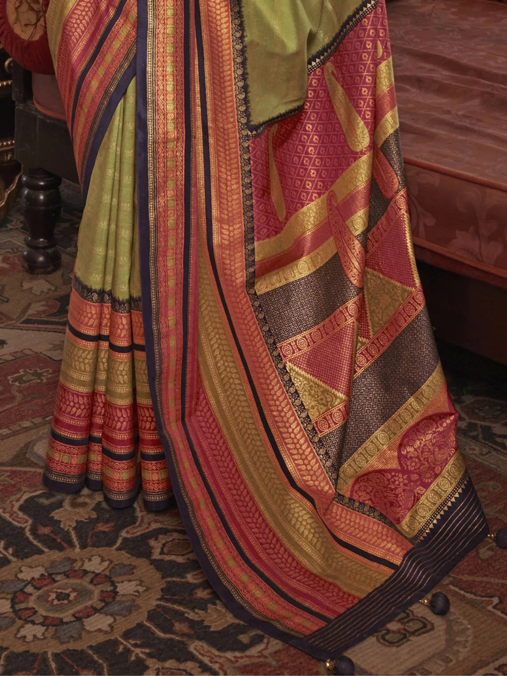 Stunning Olive Green Zari Weaving Silk Function Wear Saree With Blouse