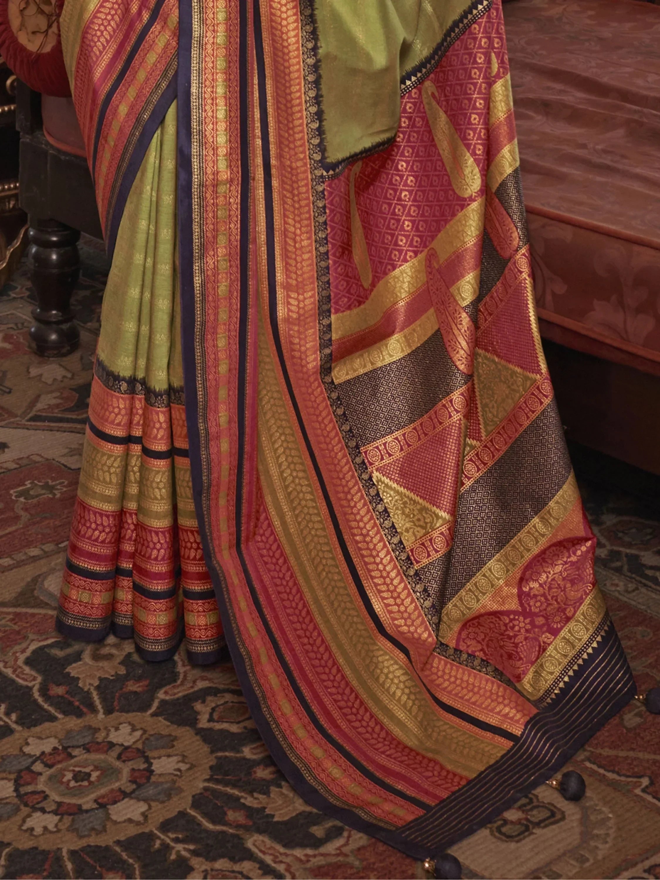 Stunning Olive Green Zari Weaving Silk Function Wear Saree With Blouse