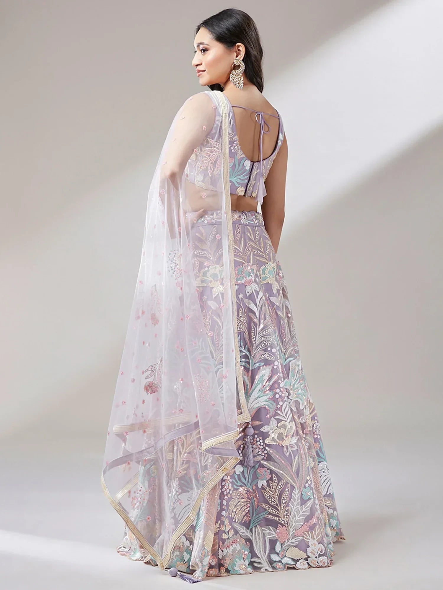 Lavender Ravishing Color Sequins Soft Net Party Wear Lehenga Choli