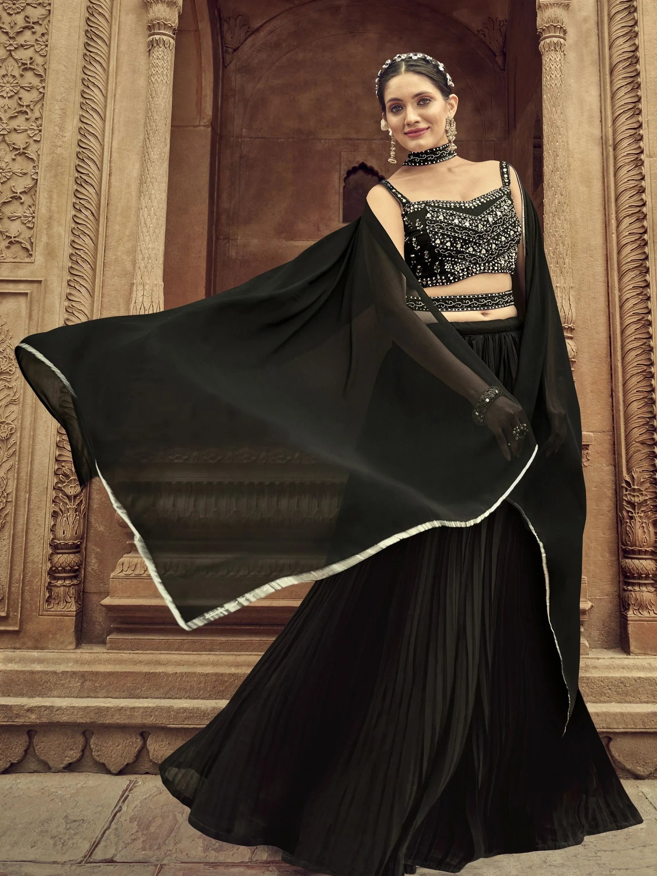 Lovely Black Hand Embroidered Georgette Reception Wear Lehenga Choli