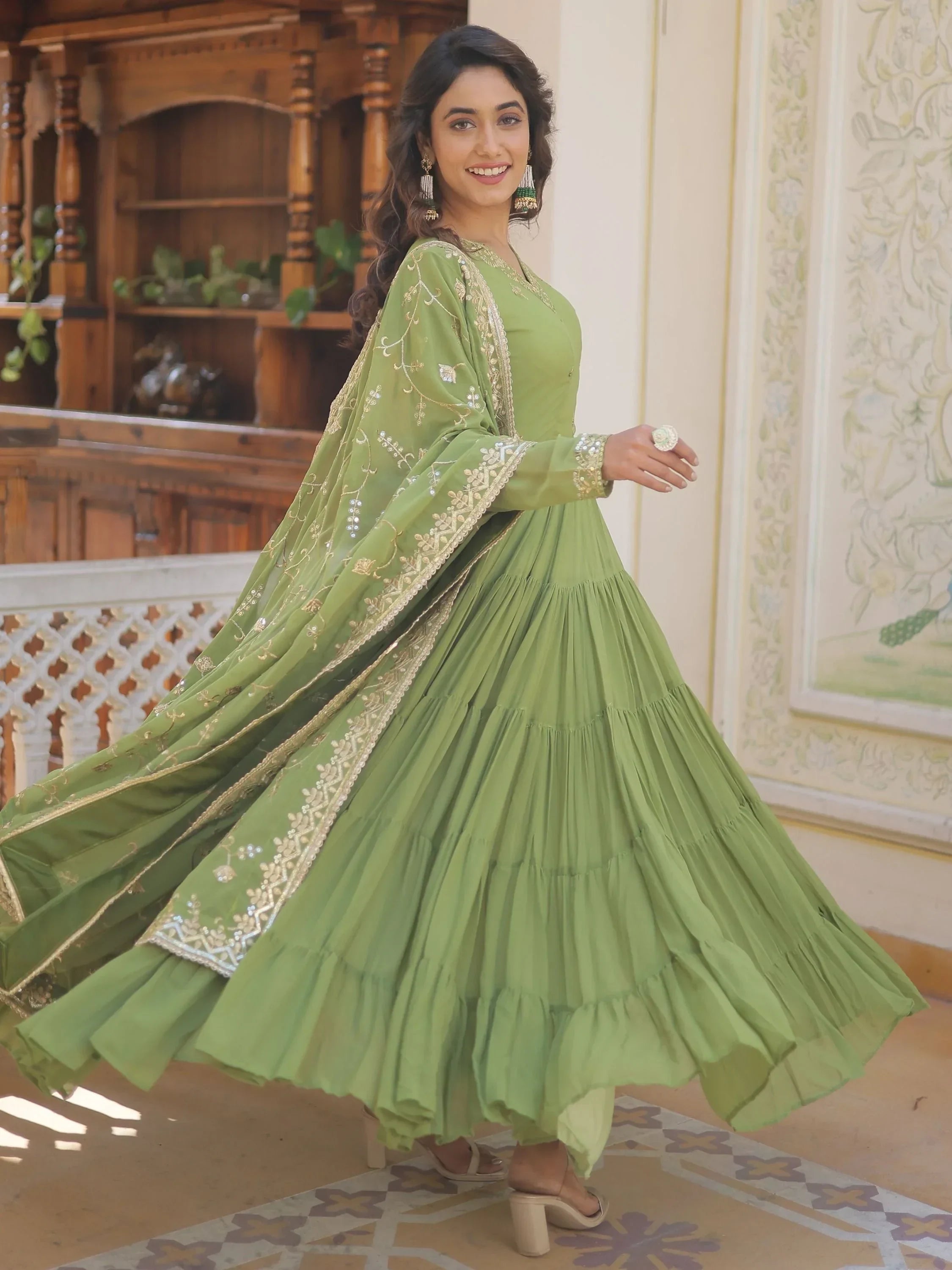 Light Green Gorgeous Light Embroidered Georgette Mehendi Wear Gown