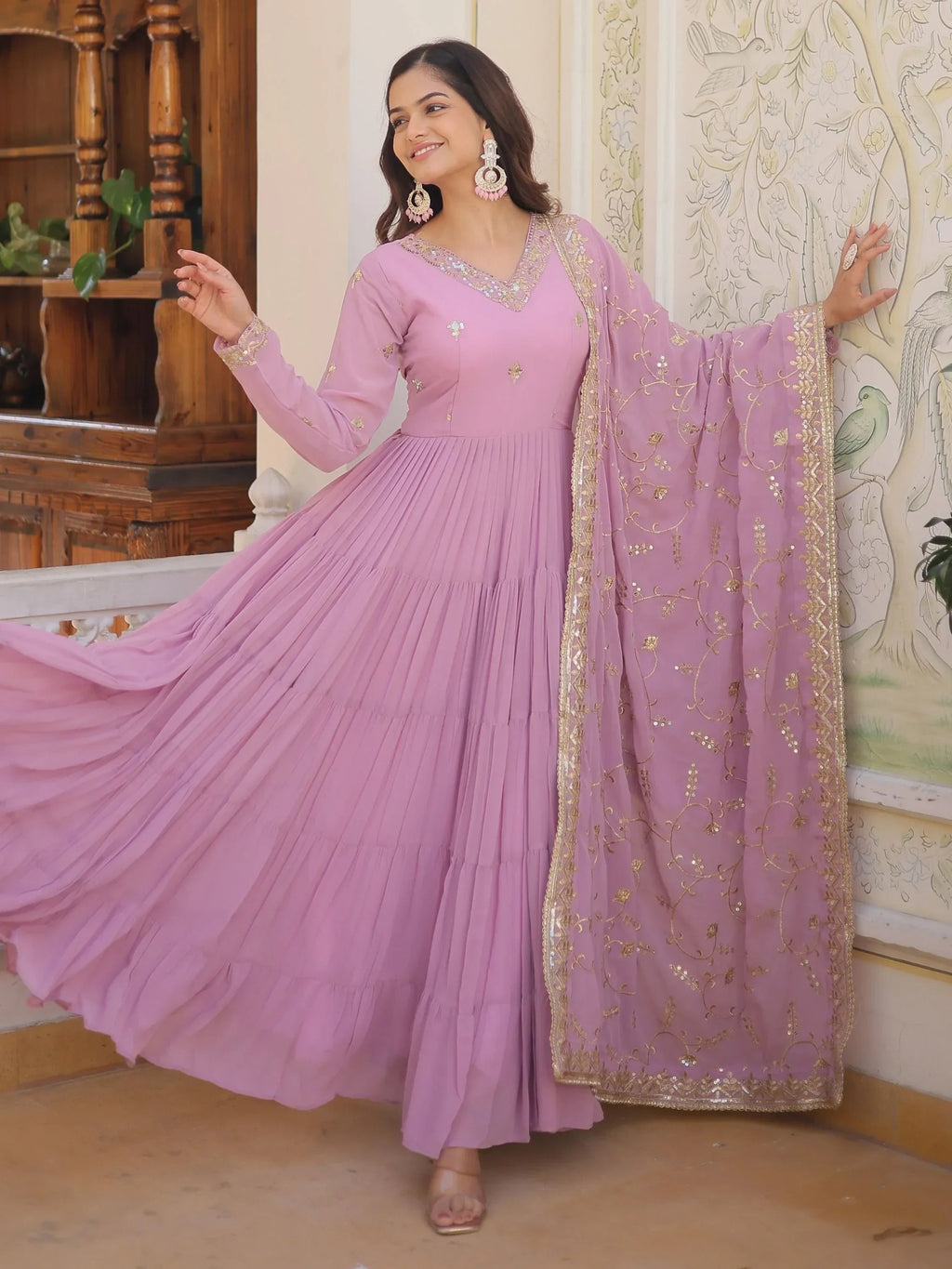 Purple Gorgeous Light Embroidered Georgette Mehendi Wear Gown