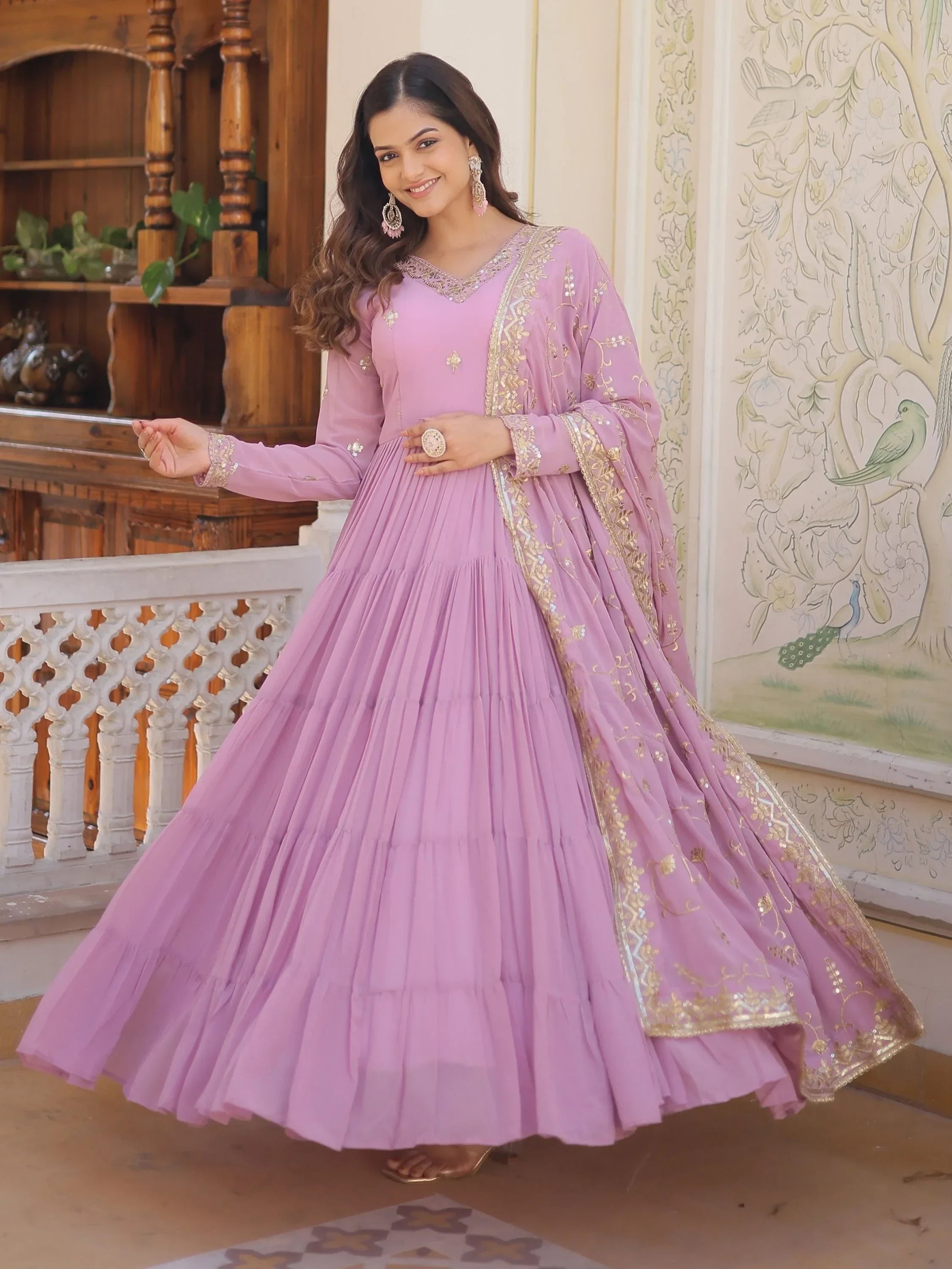 Purple Gorgeous Light Embroidered Georgette Mehendi Wear Gown