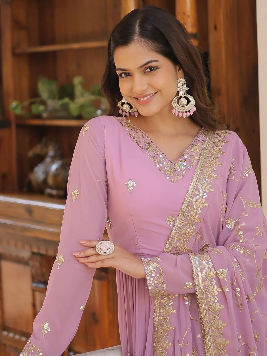 Purple Gorgeous Light Embroidered Georgette Mehendi Wear Gown