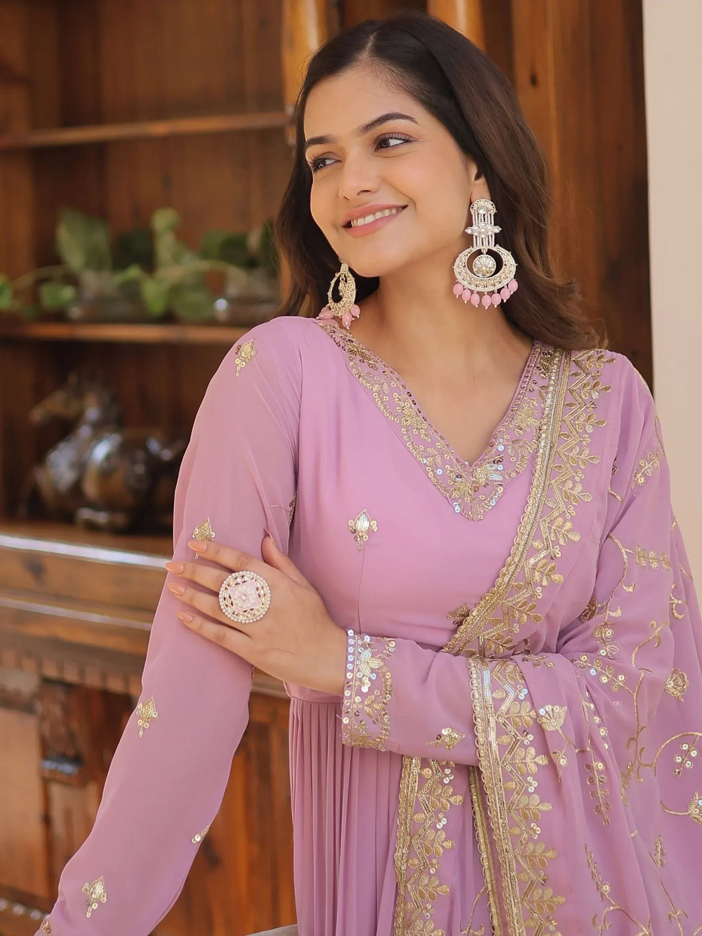 Purple Gorgeous Light Embroidered Georgette Mehendi Wear Gown