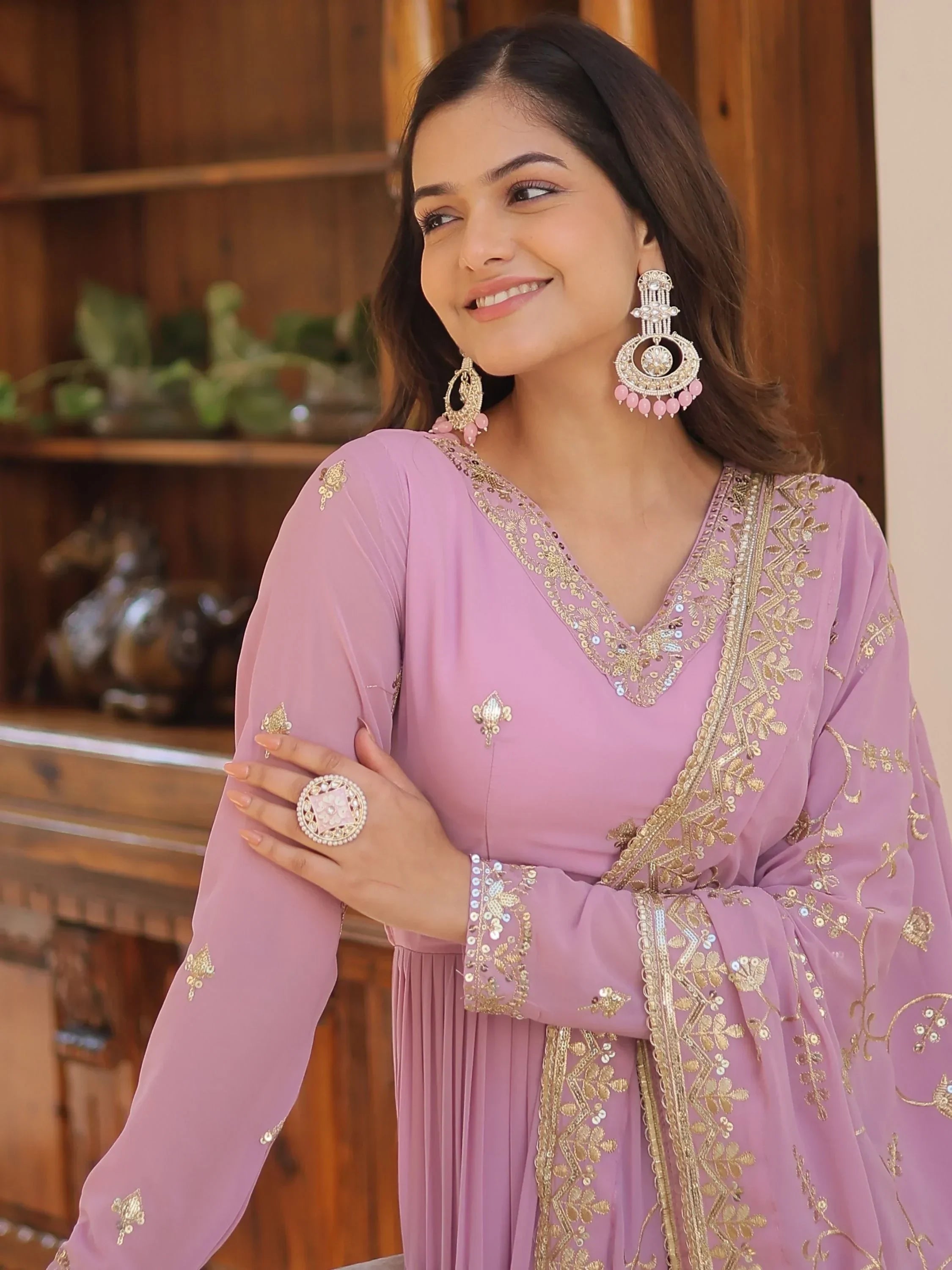 Purple Gorgeous Light Embroidered Georgette Mehendi Wear Gown