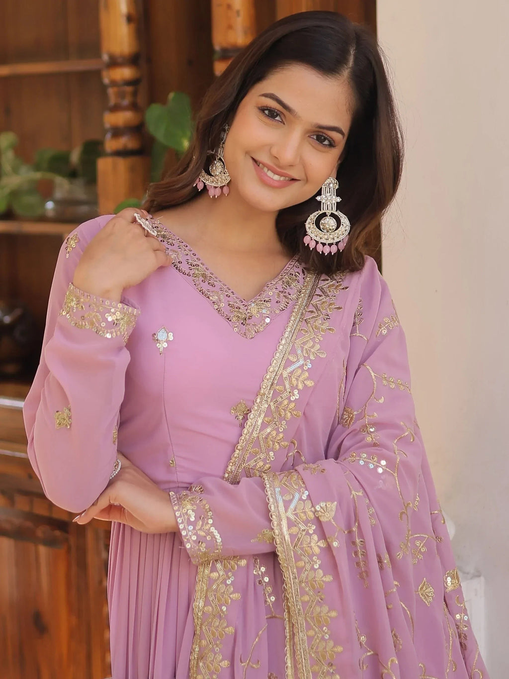 Purple Gorgeous Light Embroidered Georgette Mehendi Wear Gown