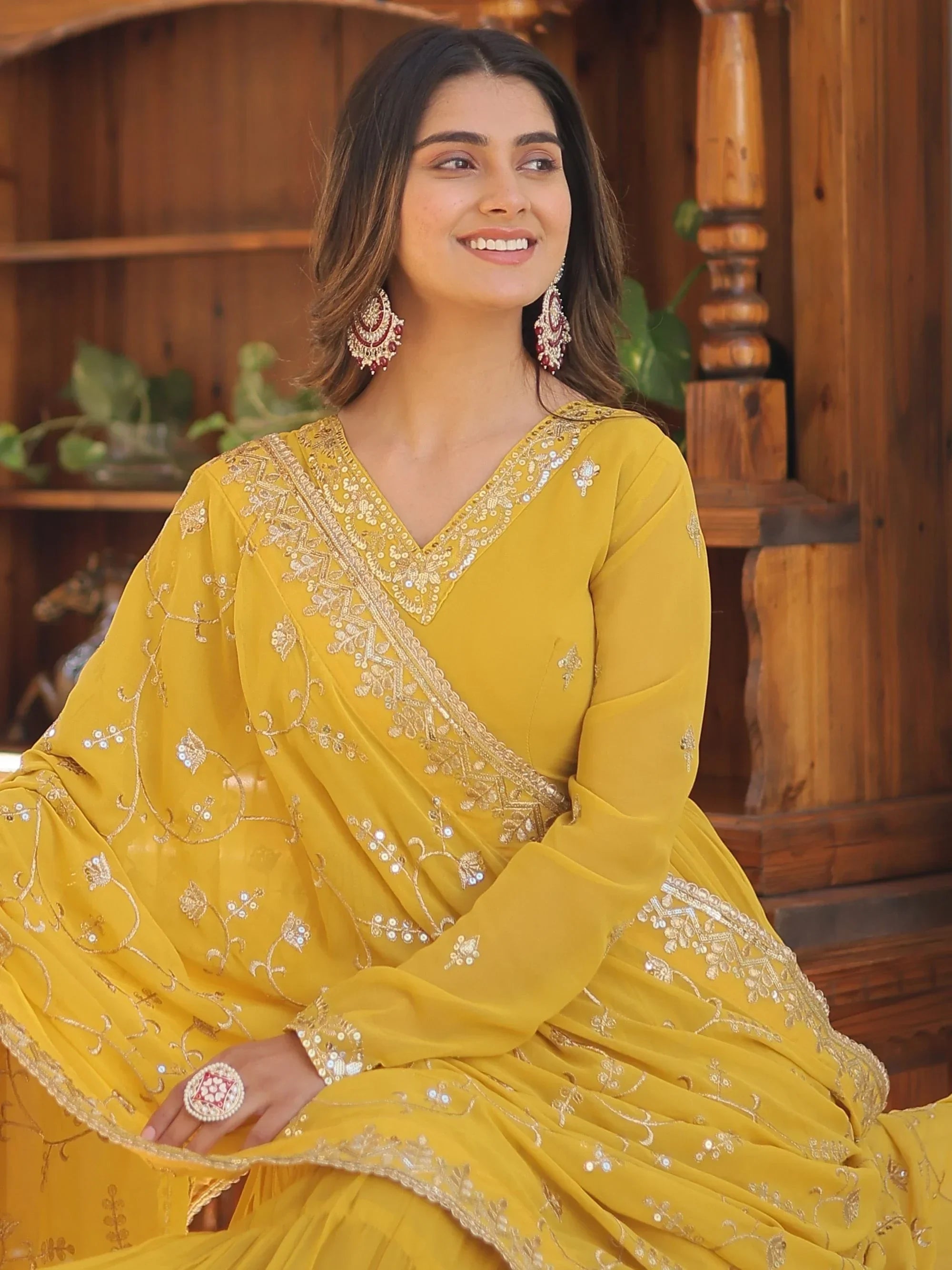 Yellow Gorgeous Light Embroidered Georgette Mehendi Wear Gown