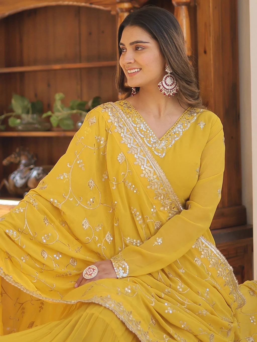 Yellow Gorgeous Light Embroidered Georgette Mehendi Wear Gown
