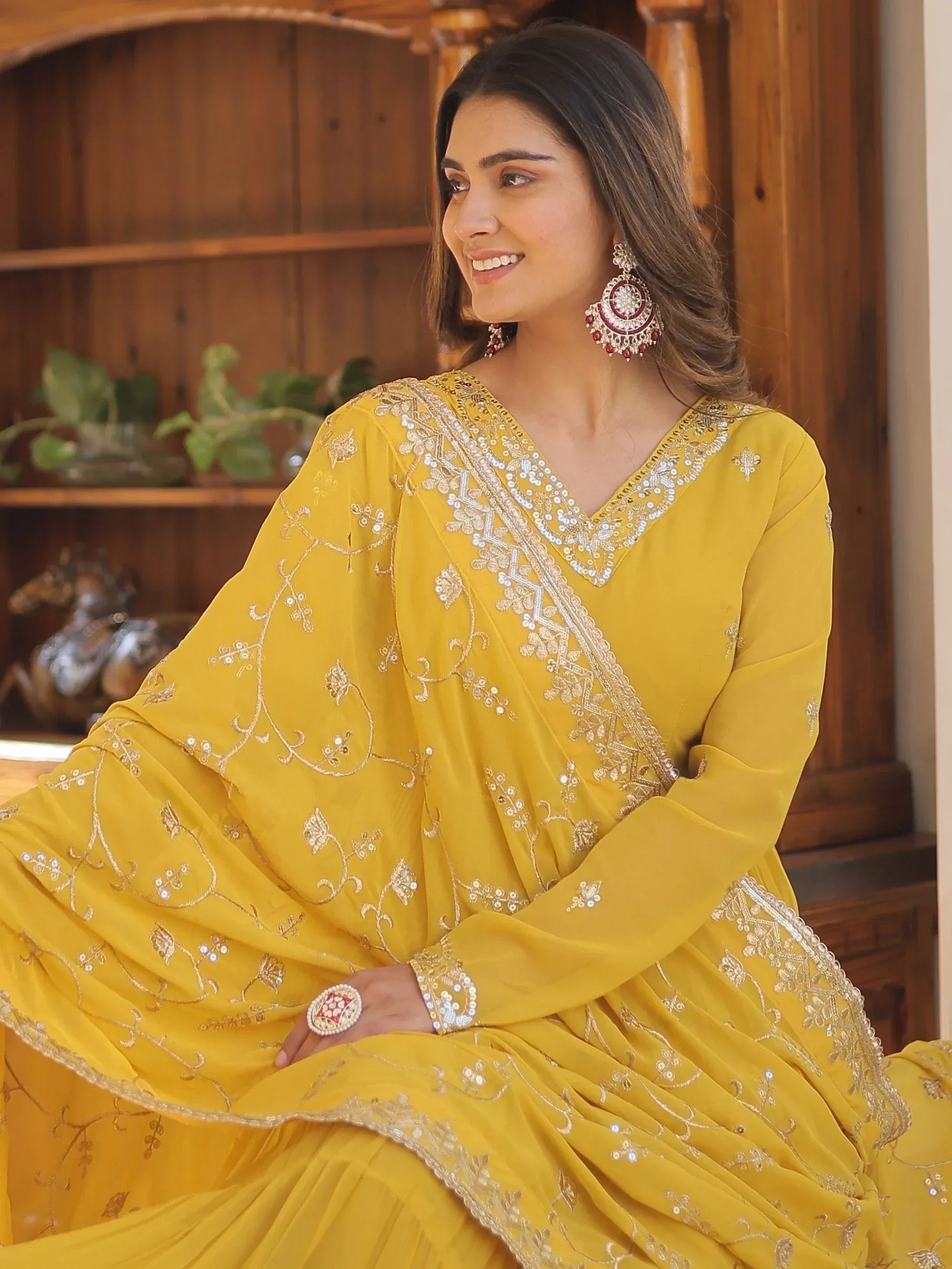 Yellow Gorgeous Light Embroidered Georgette Mehendi Wear Gown