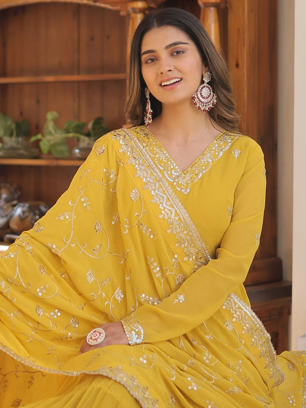 Yellow Gorgeous Light Embroidered Georgette Mehendi Wear Gown