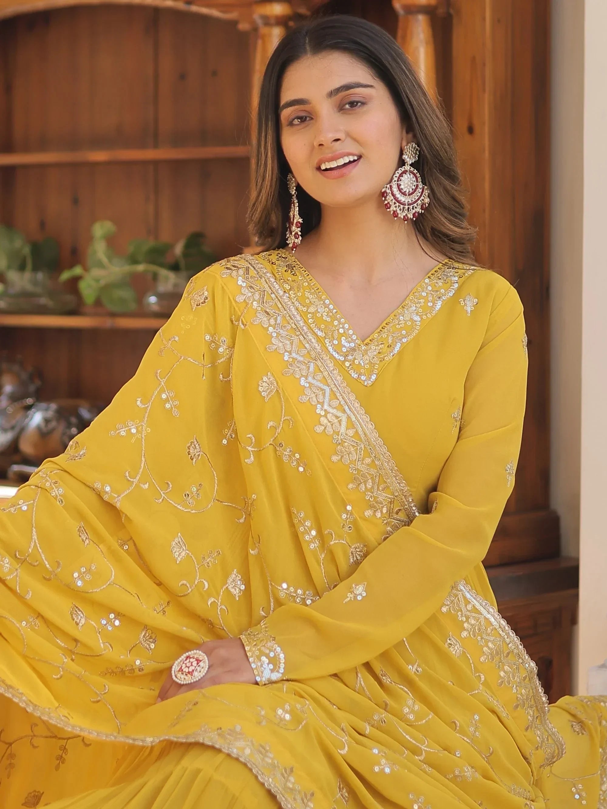 Yellow Gorgeous Light Embroidered Georgette Mehendi Wear Gown