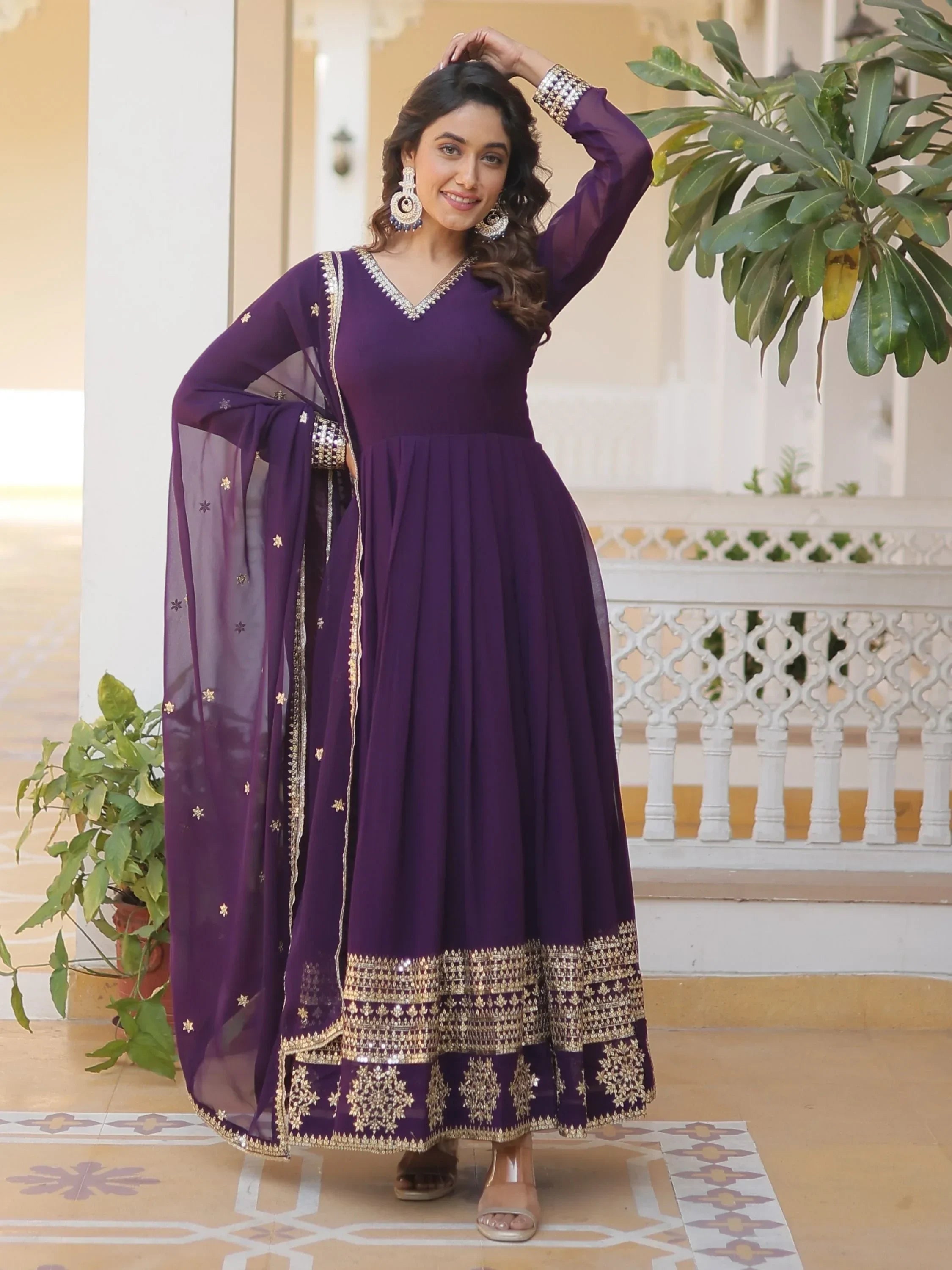 Fabulous Purple Sequins Georgette Reception Wear Gown With Dupatta